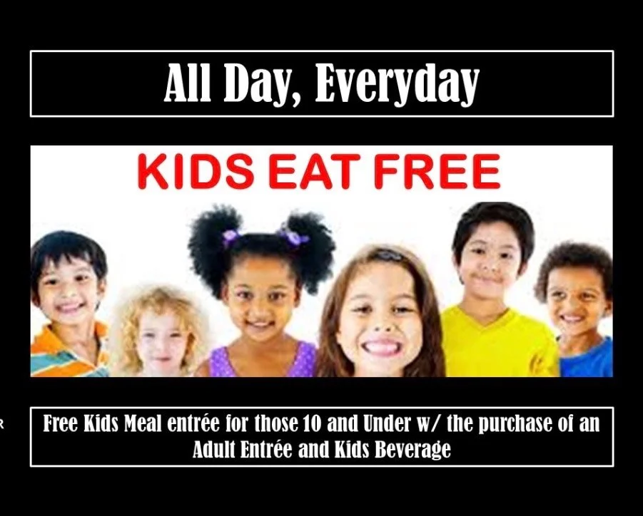 A promotional flyer showing a diverse group of smiling children, with bold text advertising kids eat free all day, every day, with a special offer for a free kids meal with certain meal purchase conditions.