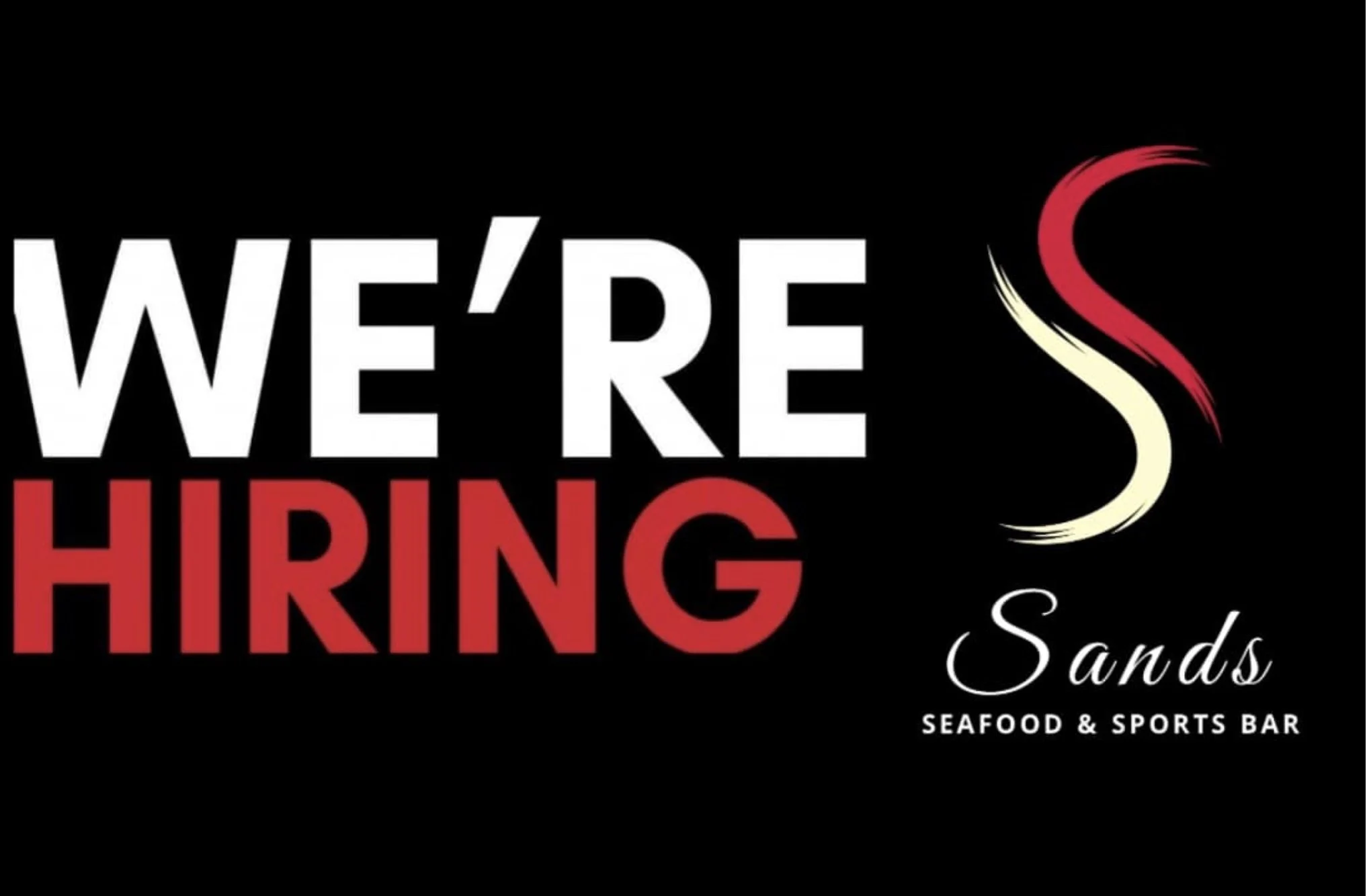 Sign for Sands Seafood & Sports Bar with large text saying "We're Hiring" and a stylized wine glass illustration.