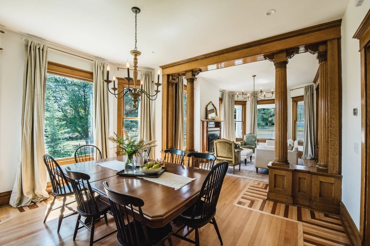 Victorian dining room, ornate wood columns, inlay floors, Windsor chairs - montana interior designer, Designer Interiors