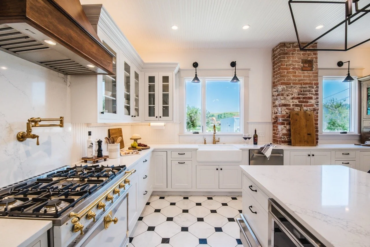 Victorian kitchen, exposed brick, brass pot filler, farmhouse sink - modern rustic interior design, Designer Interiors