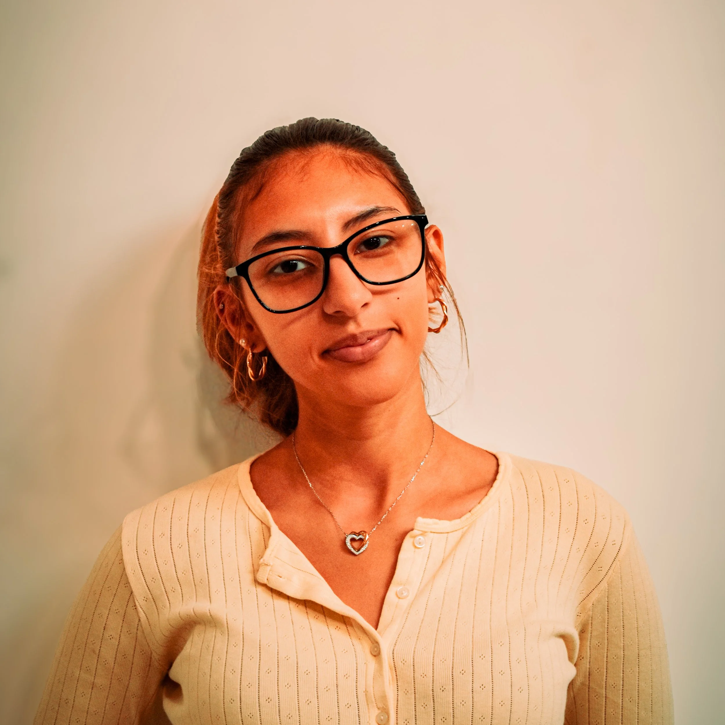 A headshot photograph of Jazlene Paneto, the Advisor for The Hudson Scholar Magazine, taken by Luke McCormick