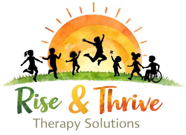 Diverse group of children playing together on a grassy hill in front of a rising sun