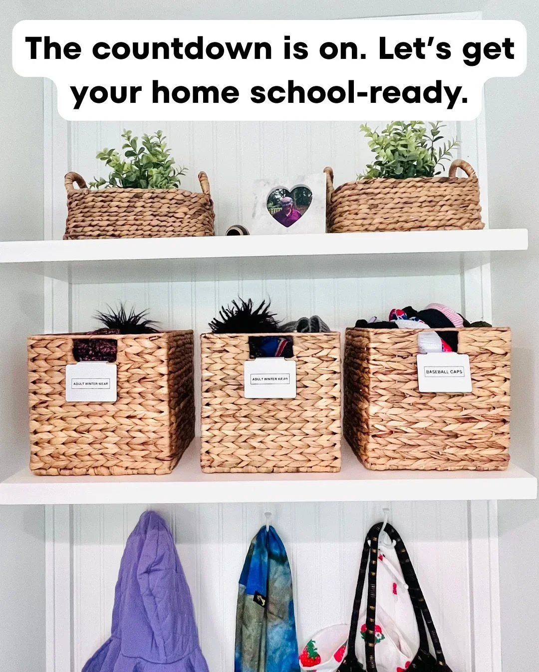 Organized Atlanta mudroom featuring labeled wicker baskets for winter wear and caps on white shelves, ready for back-to-school.