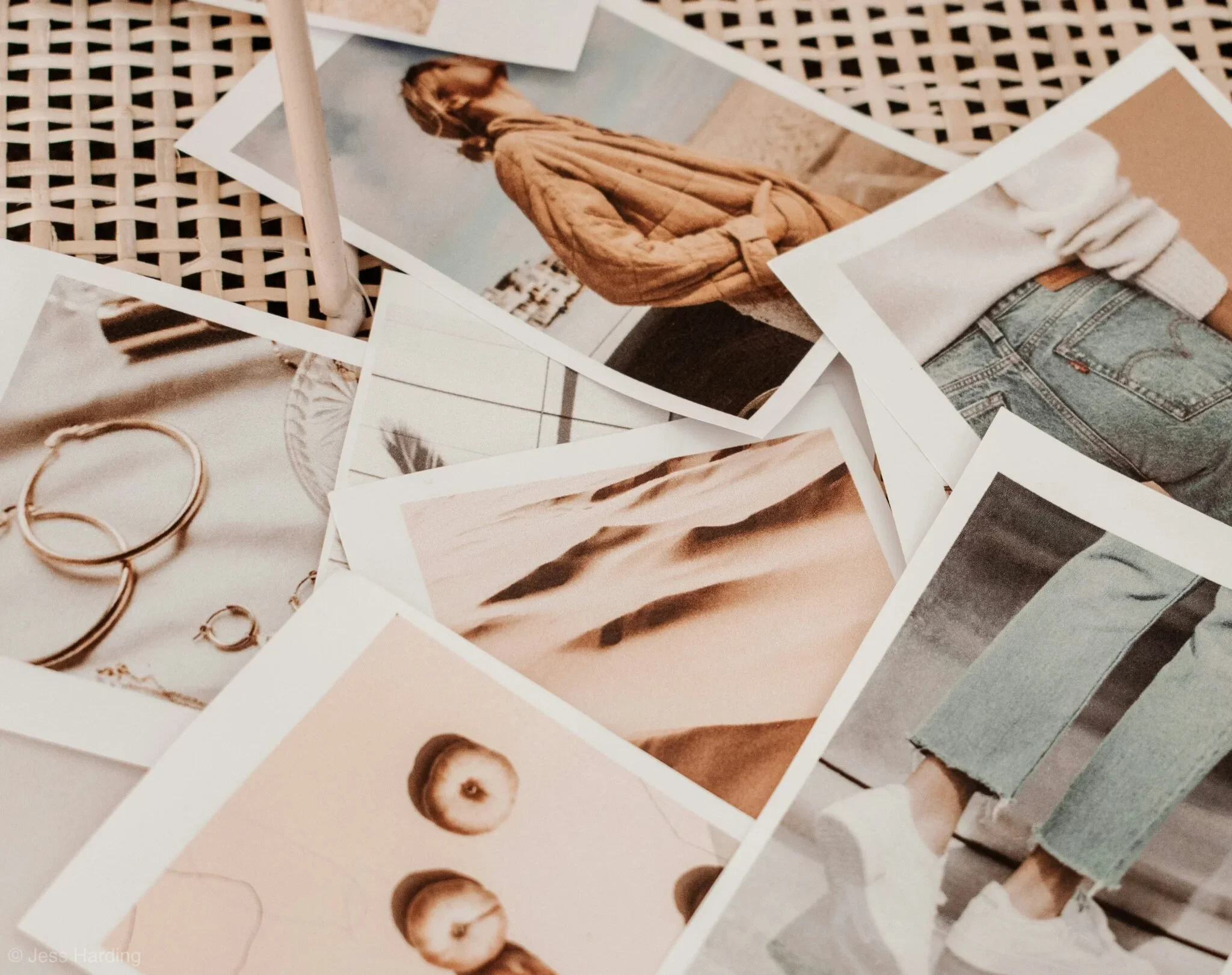 Aesthetic mood board of printed lifestyle and fashion photos for home organization inspiration.