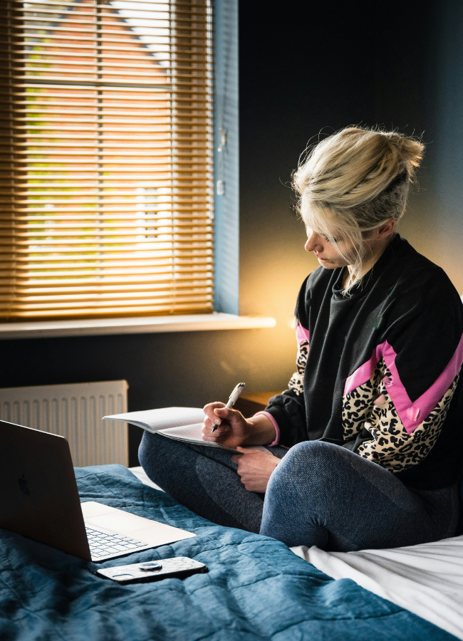 Photo of woman drafting video ideas