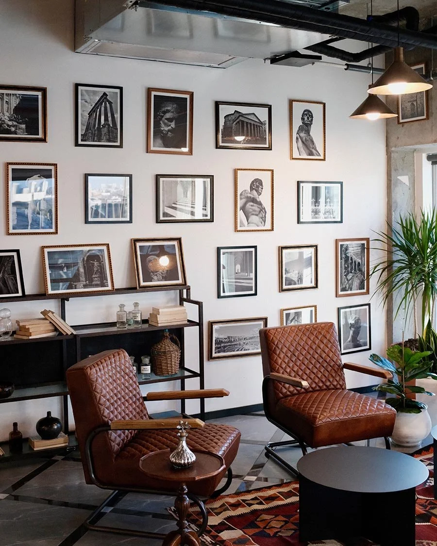 Photo of lounge area with photos on the wall