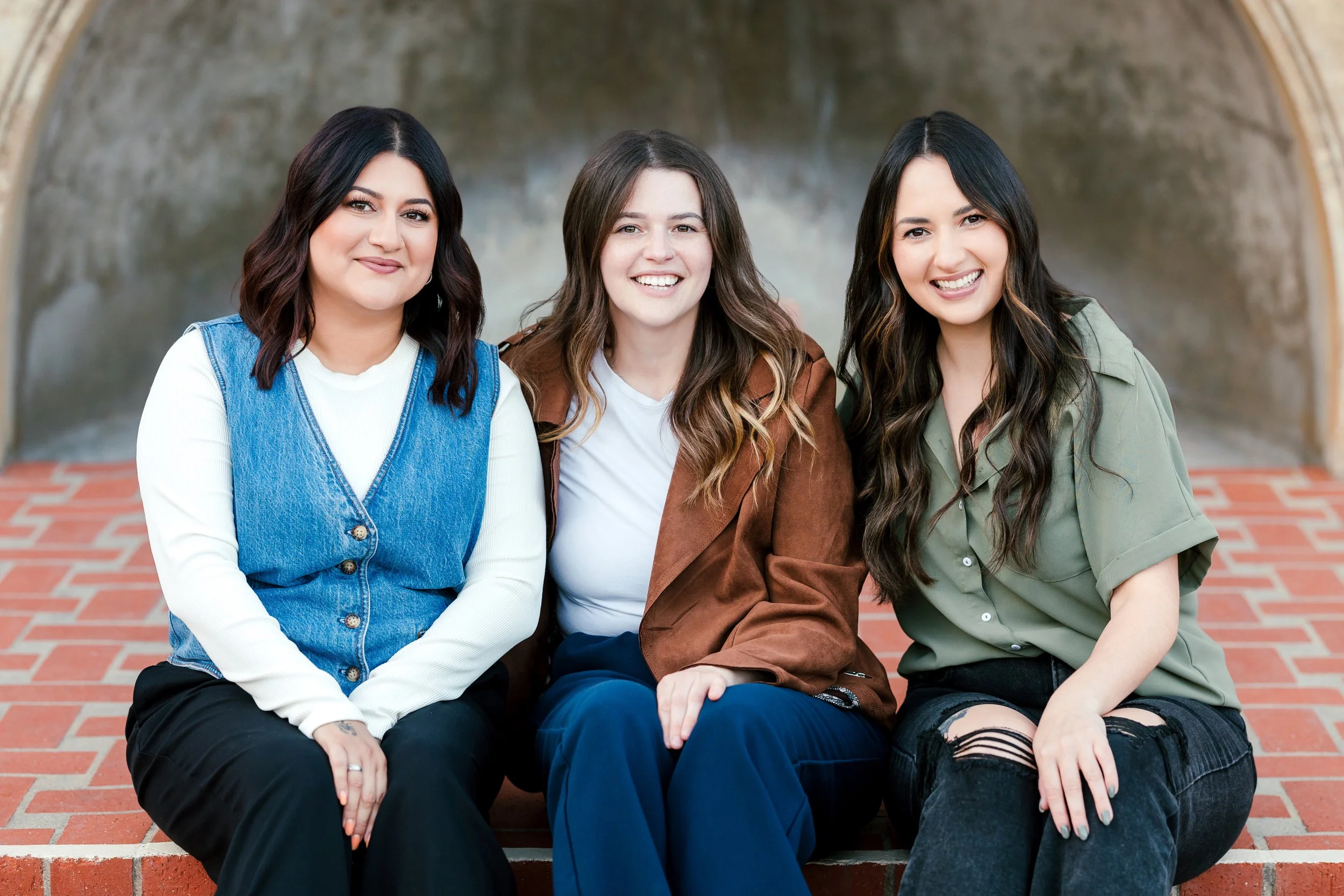 ED and OCD therapy team sitting outside Balboa park, San Diego (Parisa, Georgia and Allyson pictured)