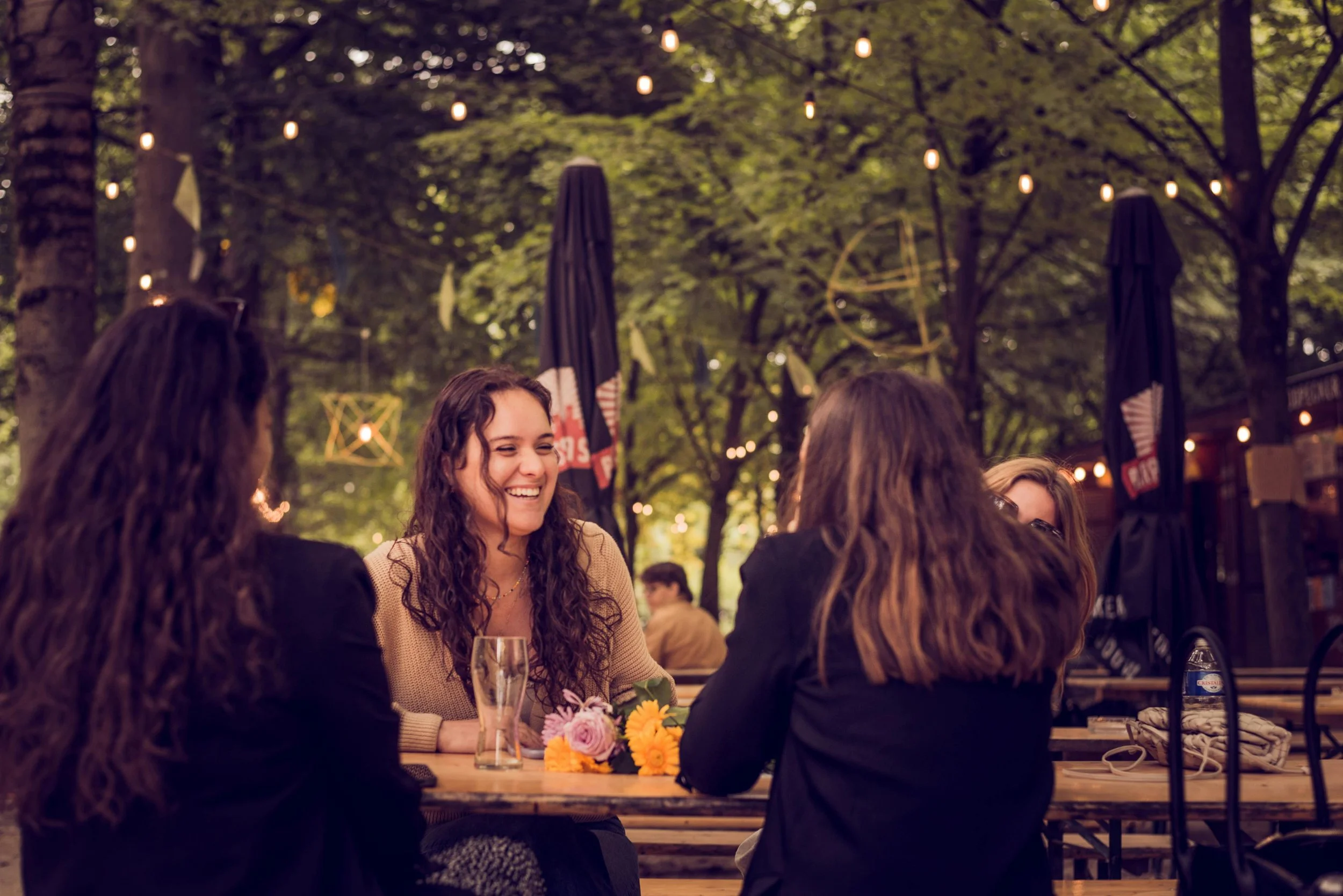 friends sitting at an outdoor restaurant