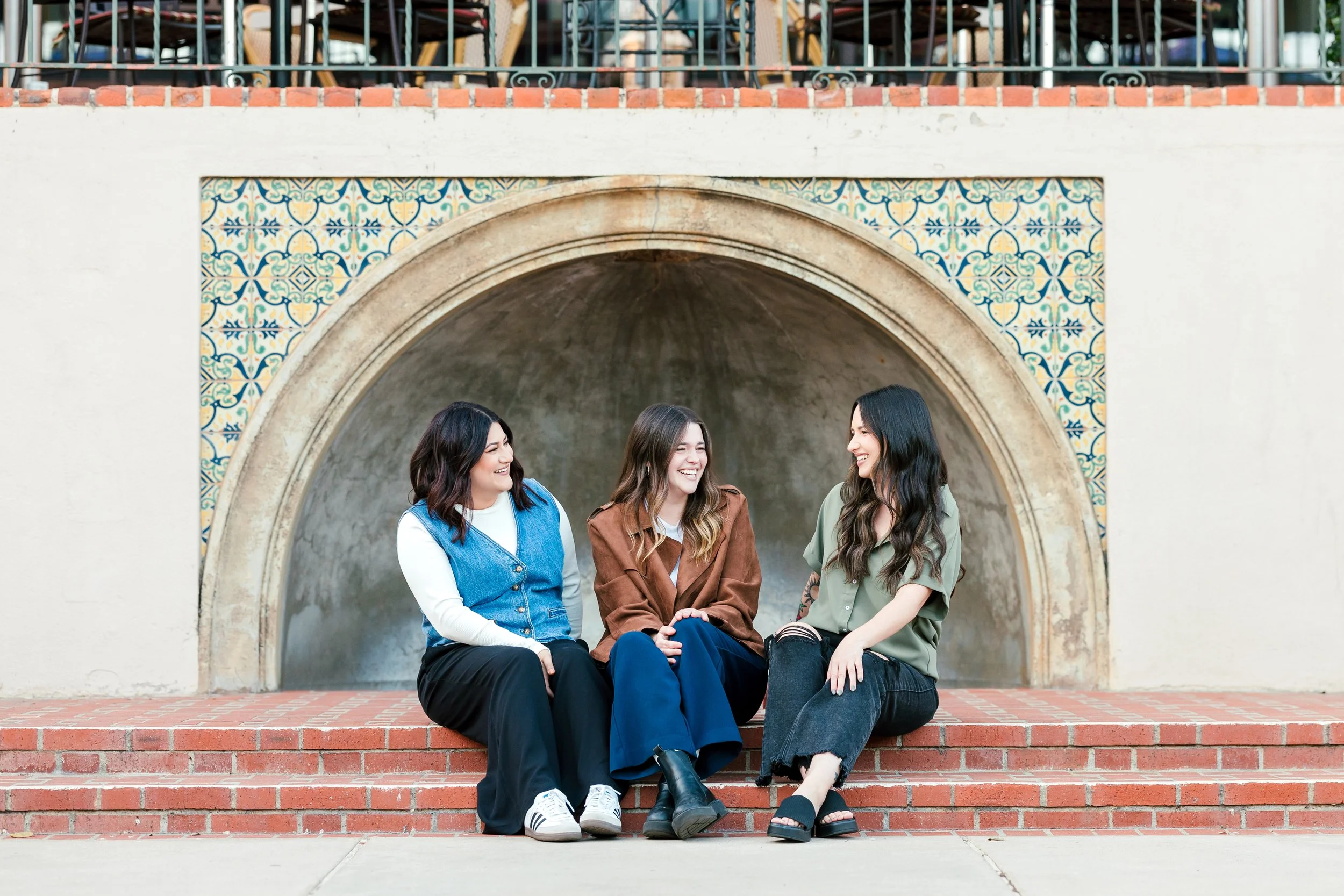 Three female ED and OCD Therapists sitting outside balboa park, San Diego, CA.