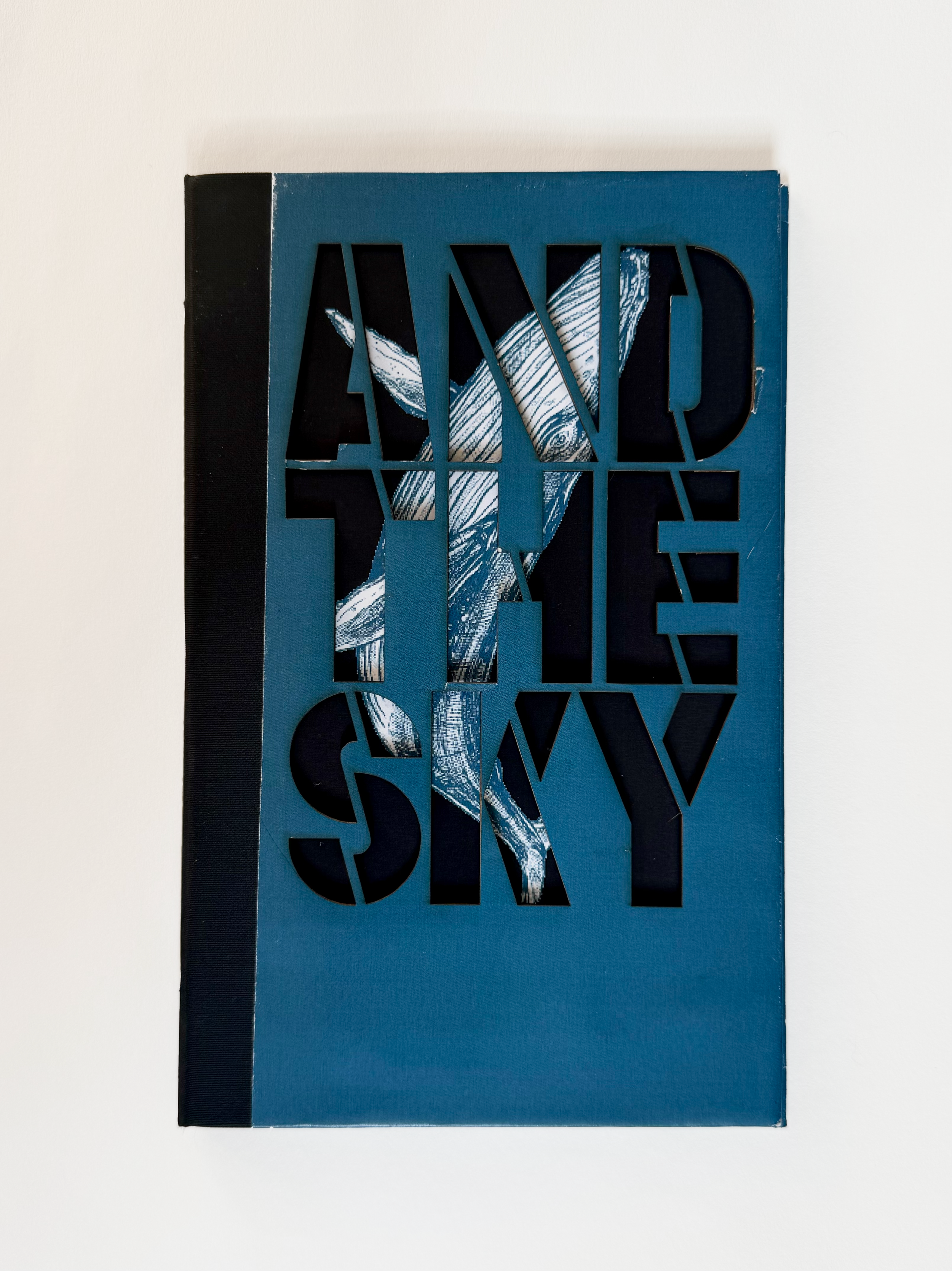 Hardcover, laser-cut and handbound