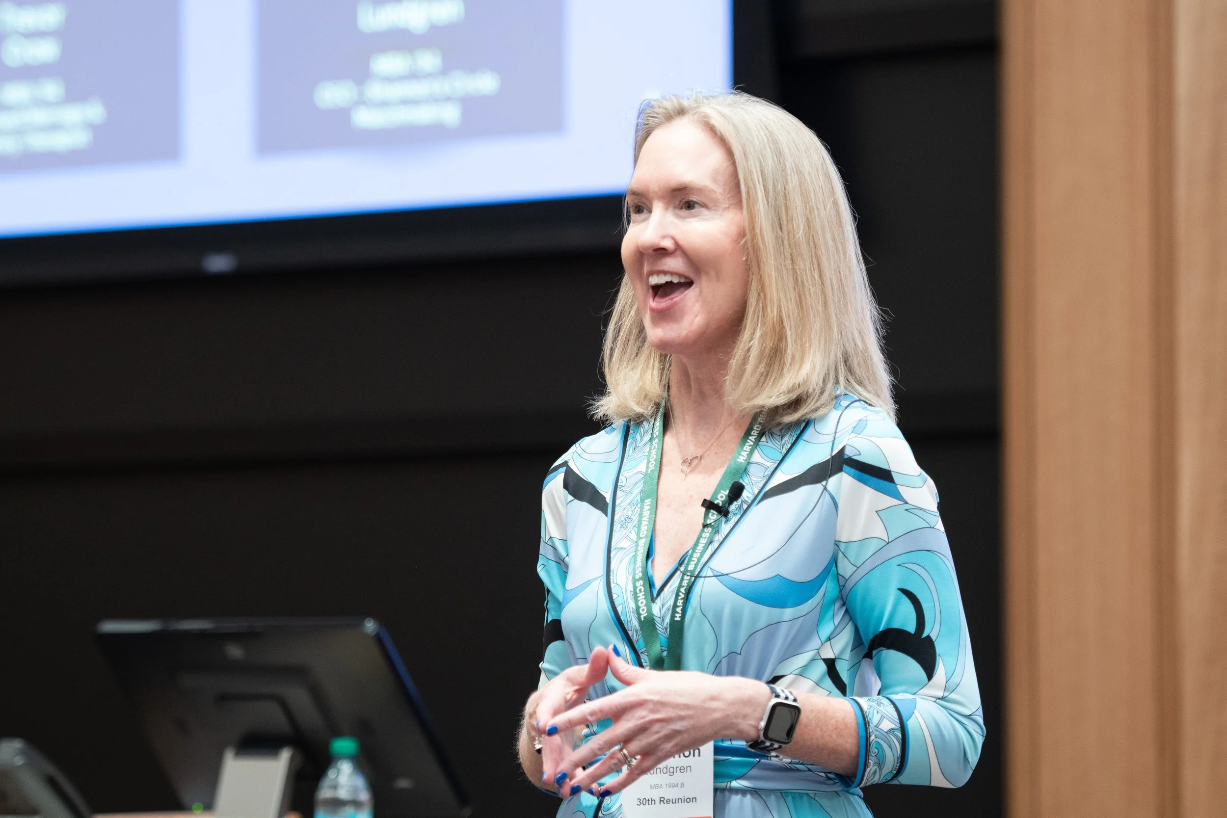 Shannon Lundgren speaking at a Harvard conference