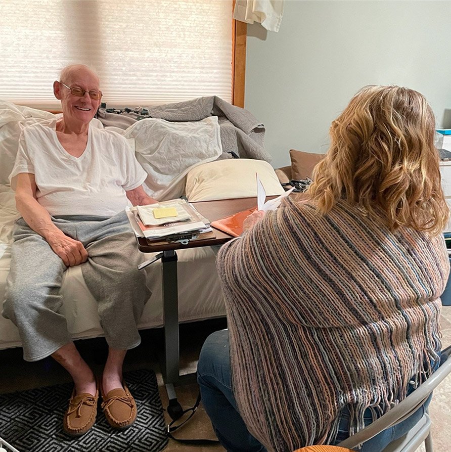 Julie of Adoray Home Health and Hospice in Wisconsin records James's life story for his legacy project.