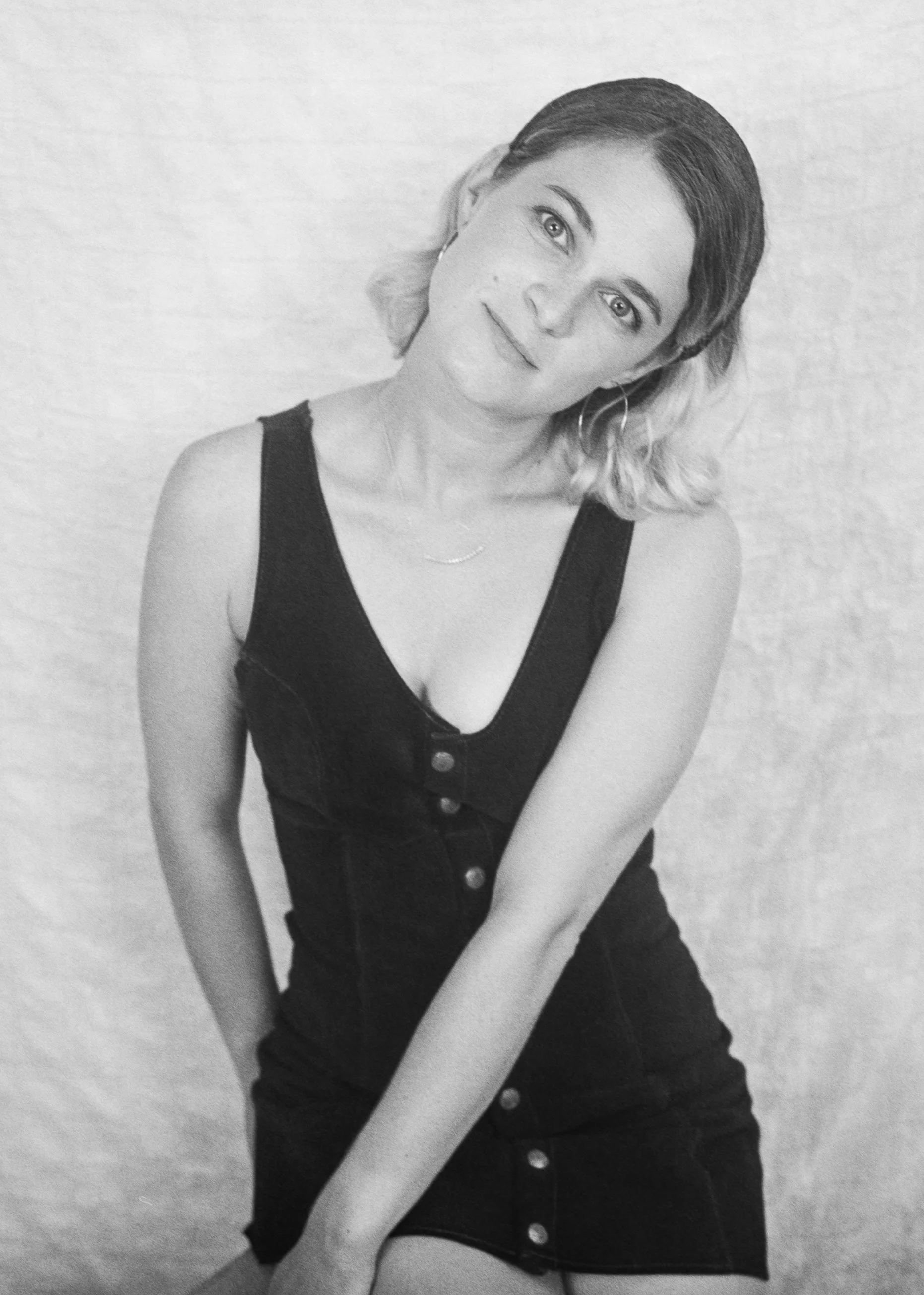 black and white woman looking at camera