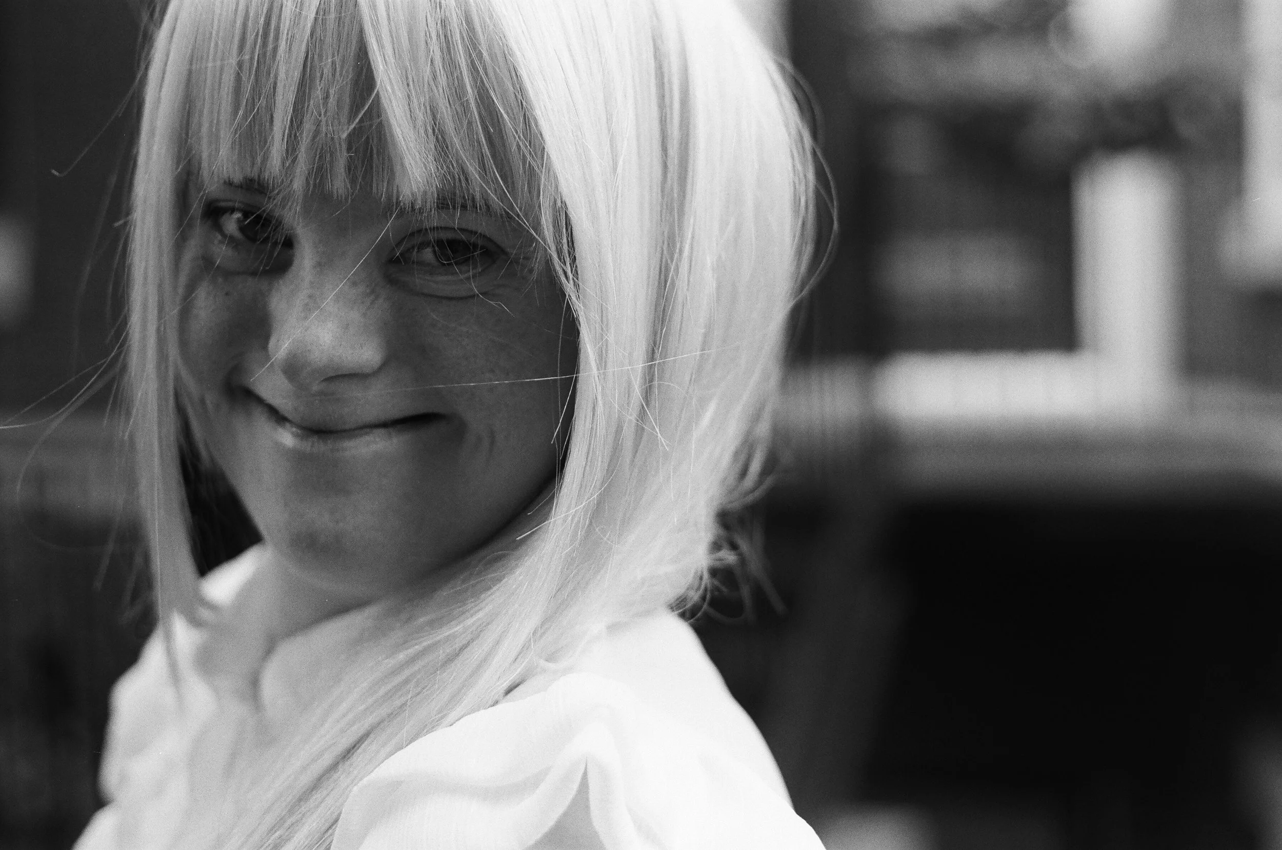 Black and WHite girl smiling at camera