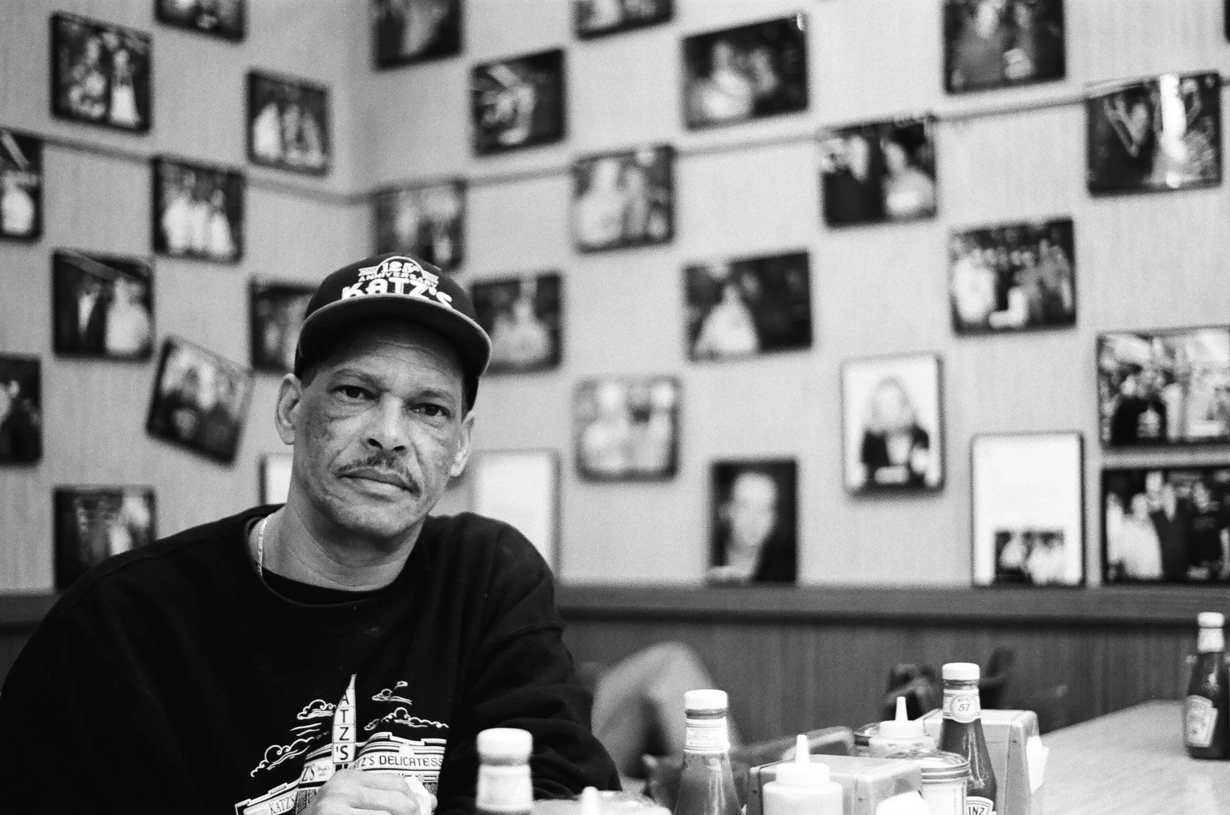 black and white man at a table