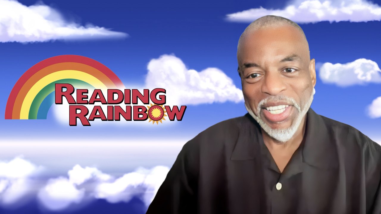 LeVar Burton with grey beard in front of of clouds with the logo Reading Rainbow