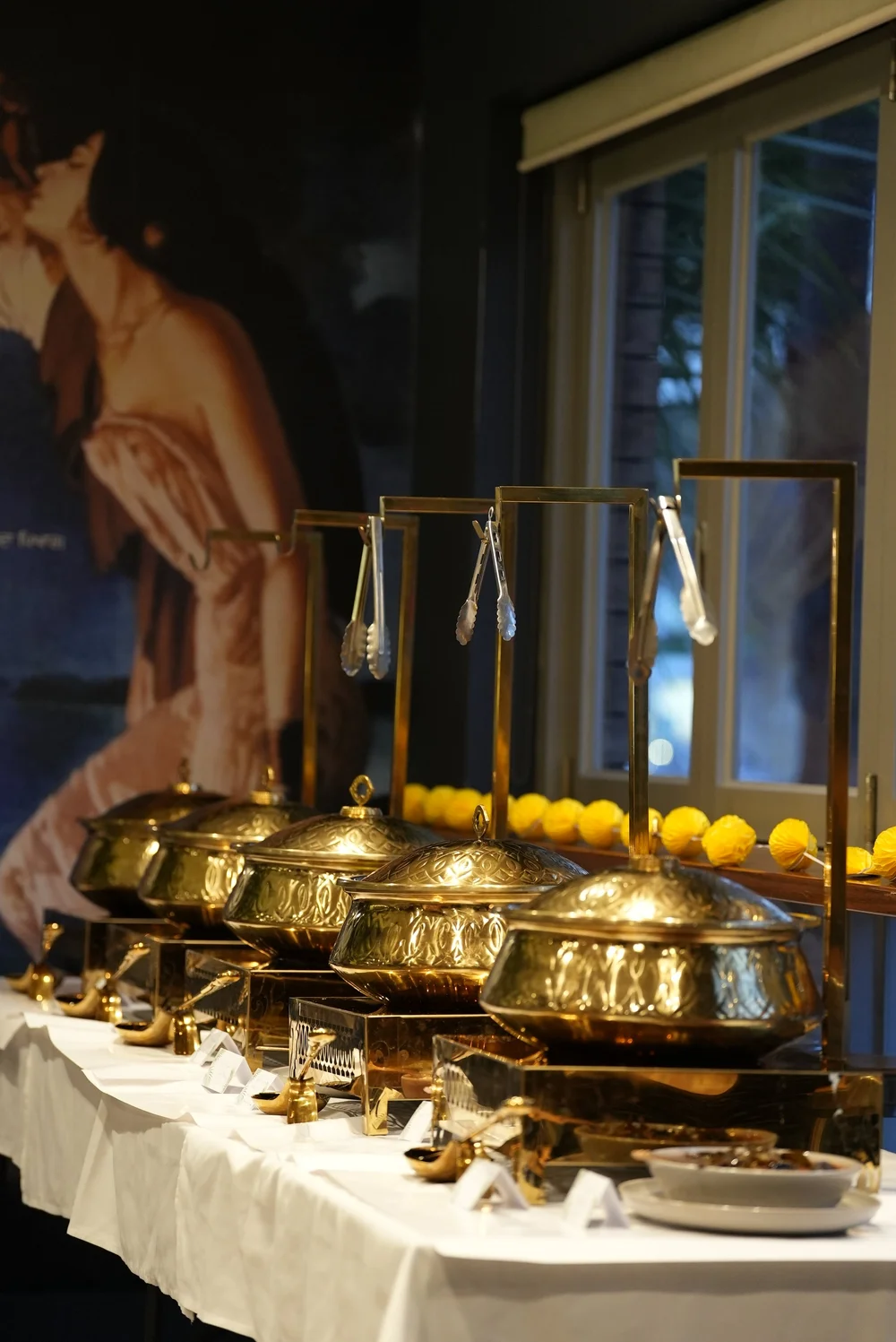 Curry Queen Catering Co. buffet with copper chafing dishes