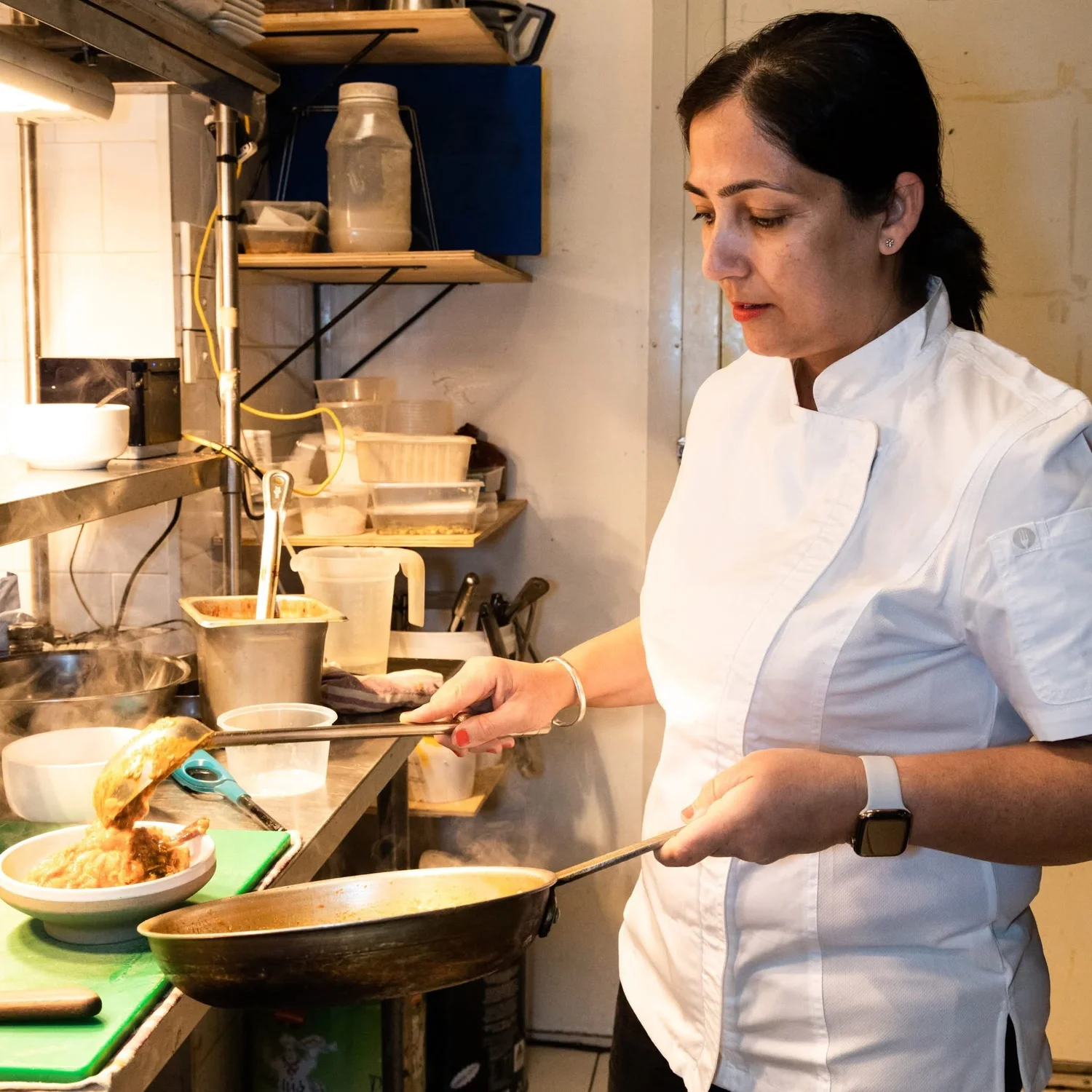 Chef Manpreet Sekhon, the Curry Queen, cooking in the Eastern Spice kitchen