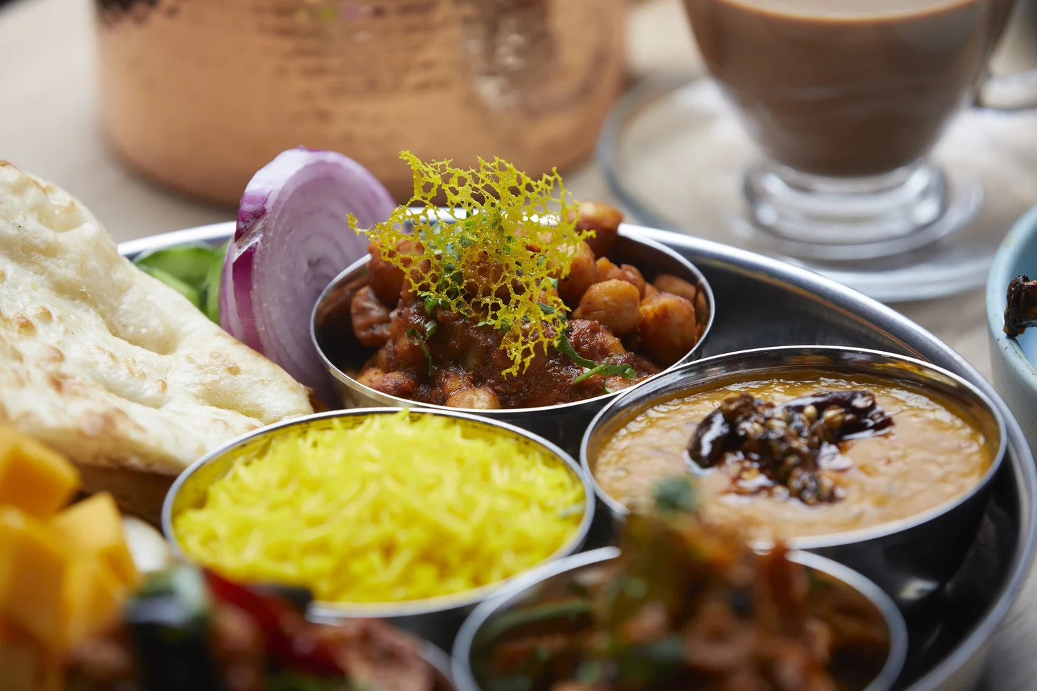 Vegan thali with daal, vegetable curries and rice