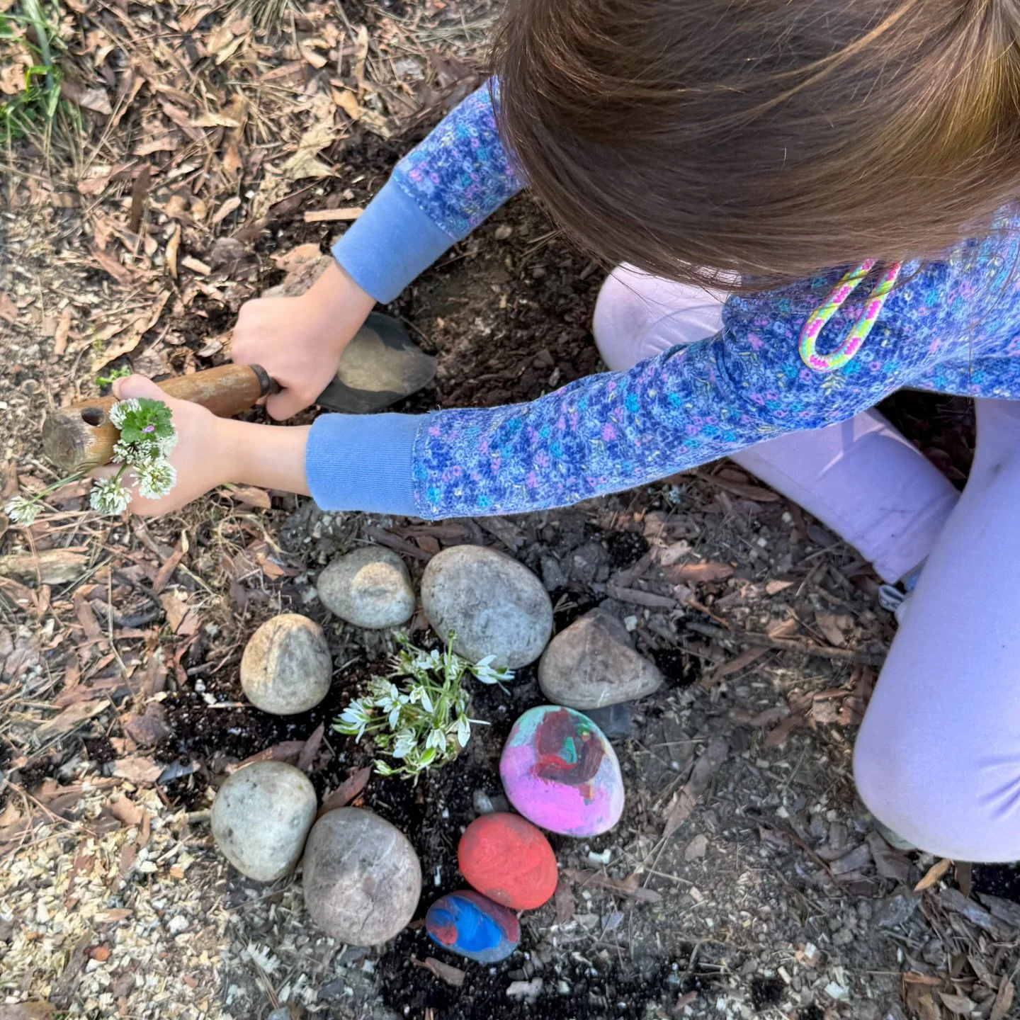 She made this all on her own 🤍

A tiny garden&hellip;
foraged flowers, little stones, even her painted rocks tucked into the soil 🌸

I watched her gather each piece so intentionally&hellip;
creating something that felt like hers

My quiet hope is t