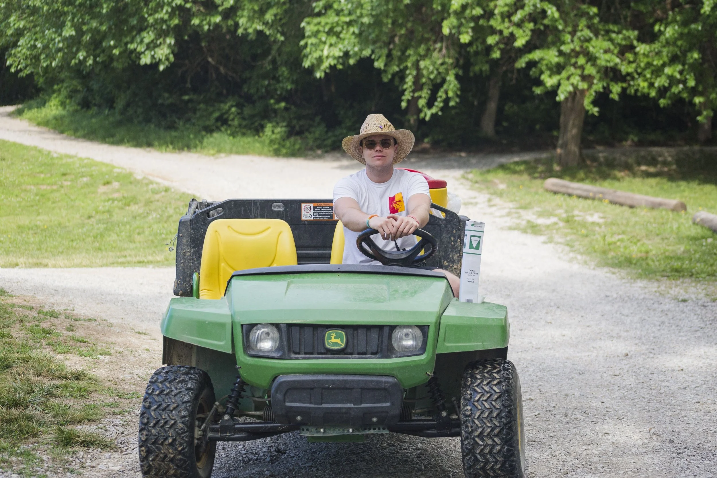 Heartland Christian Camp Paid Gap Year Internship man driving and smiling Outside Near Kansas City, Missouri