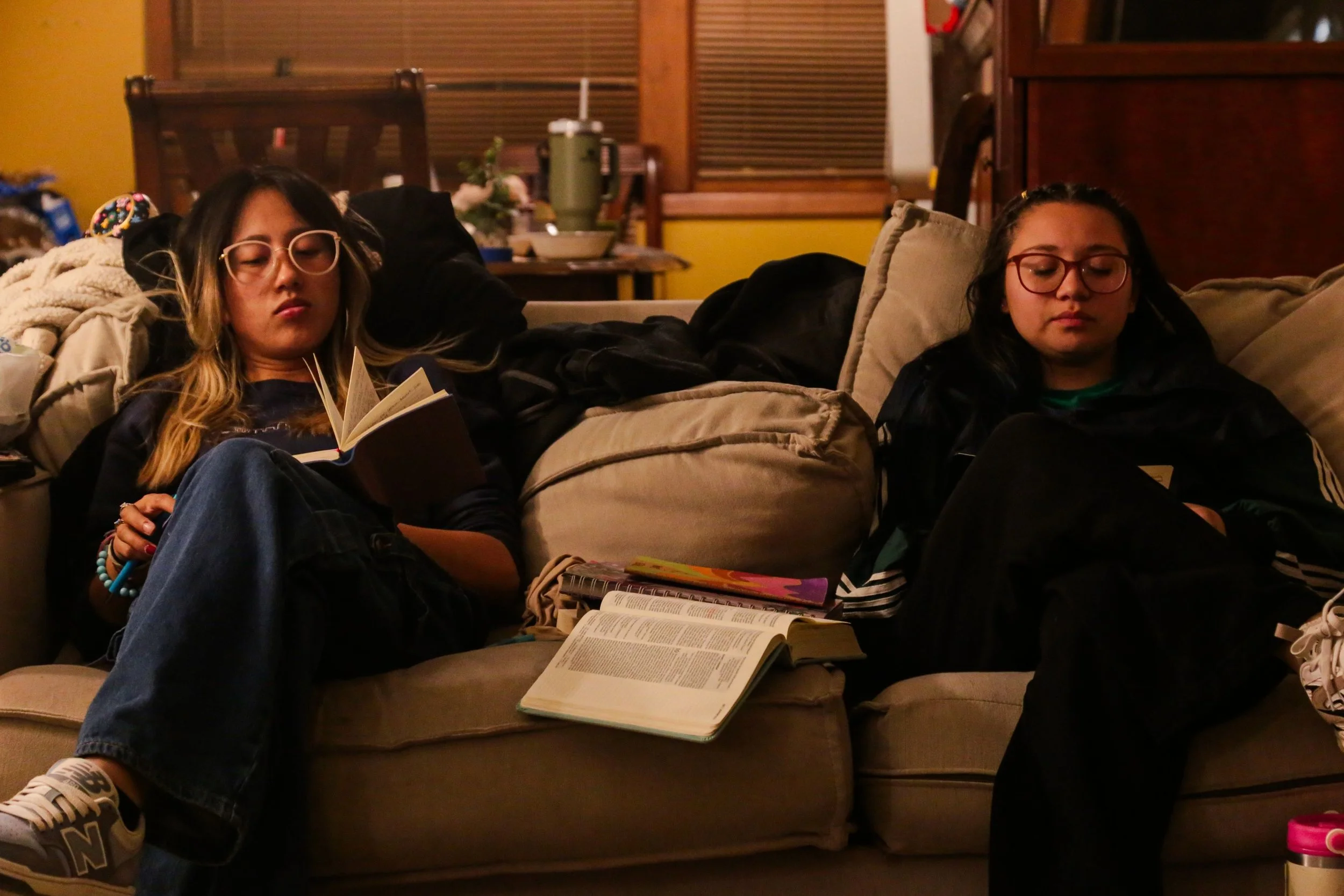 Heartland Christian Camp Paid Gap Year Internship women sitting and studying together Outside Near Kansas City, Missouri
