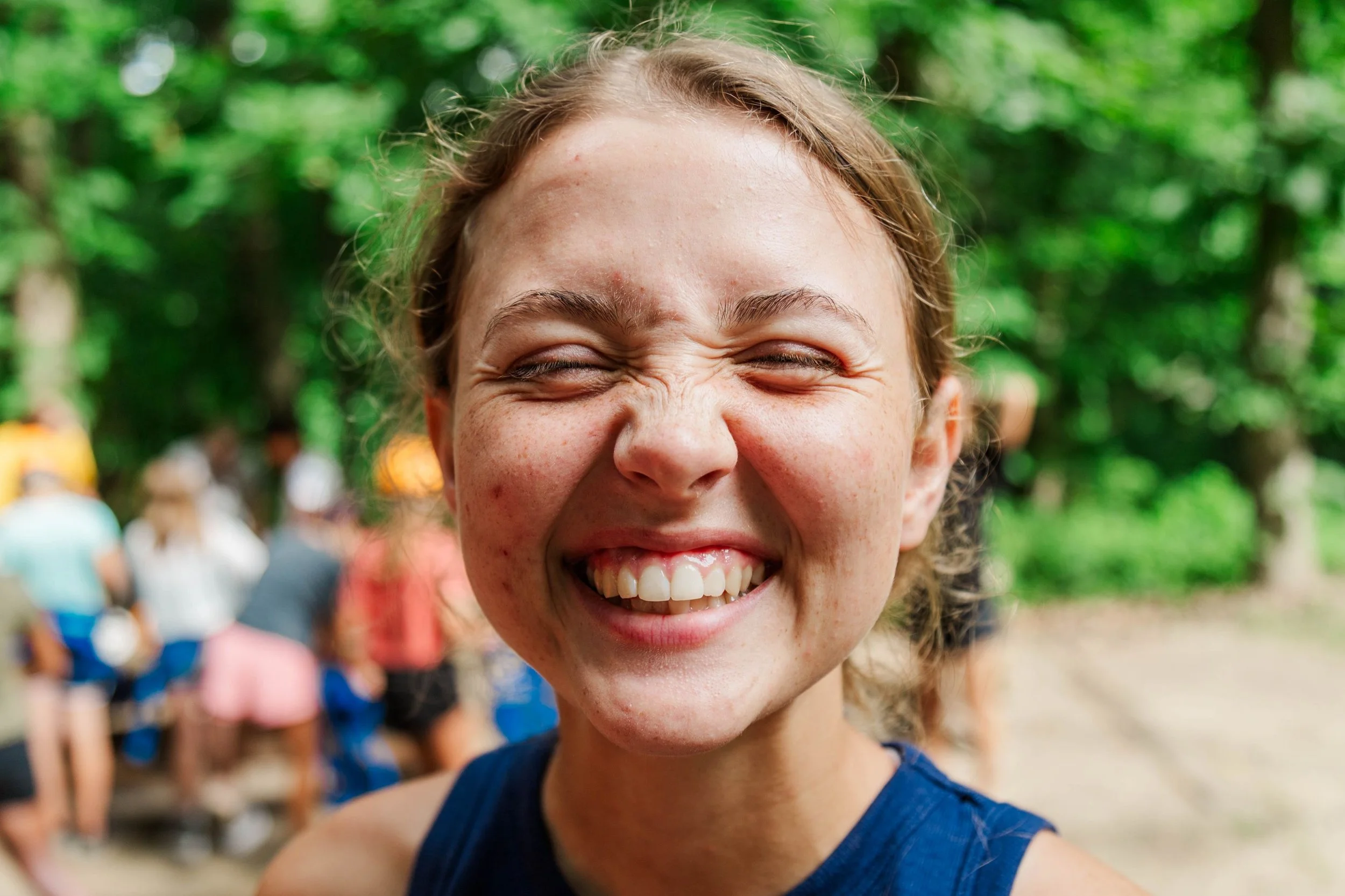 Heartland Christian Camp Paid Gap Year Internship woman standing and smiling Outside Near Kansas City, Missouri