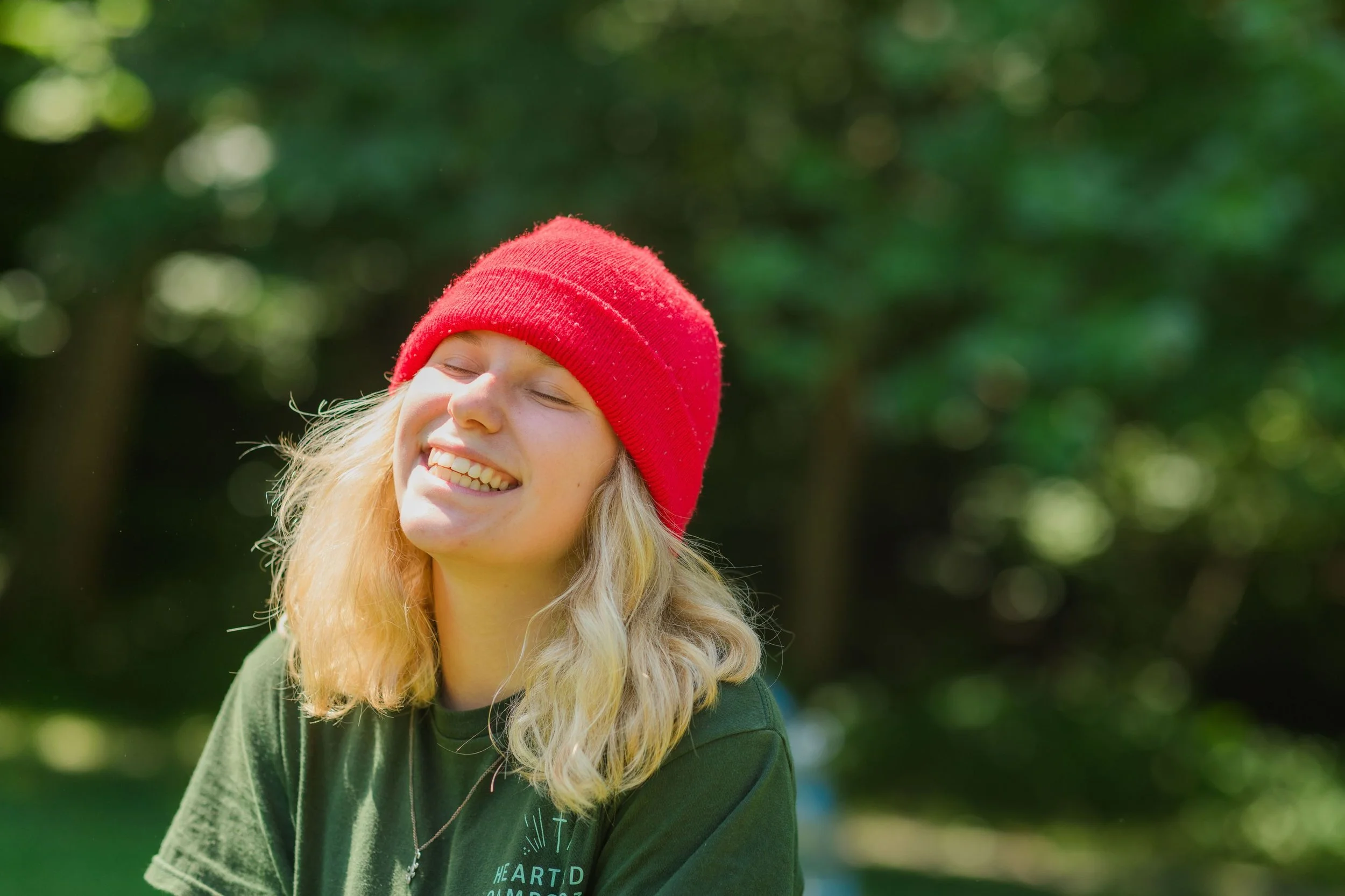 Heartland Christian Camp Paid Gap Year Internship woman standing and smiling Outside Near Kansas City, Missouri