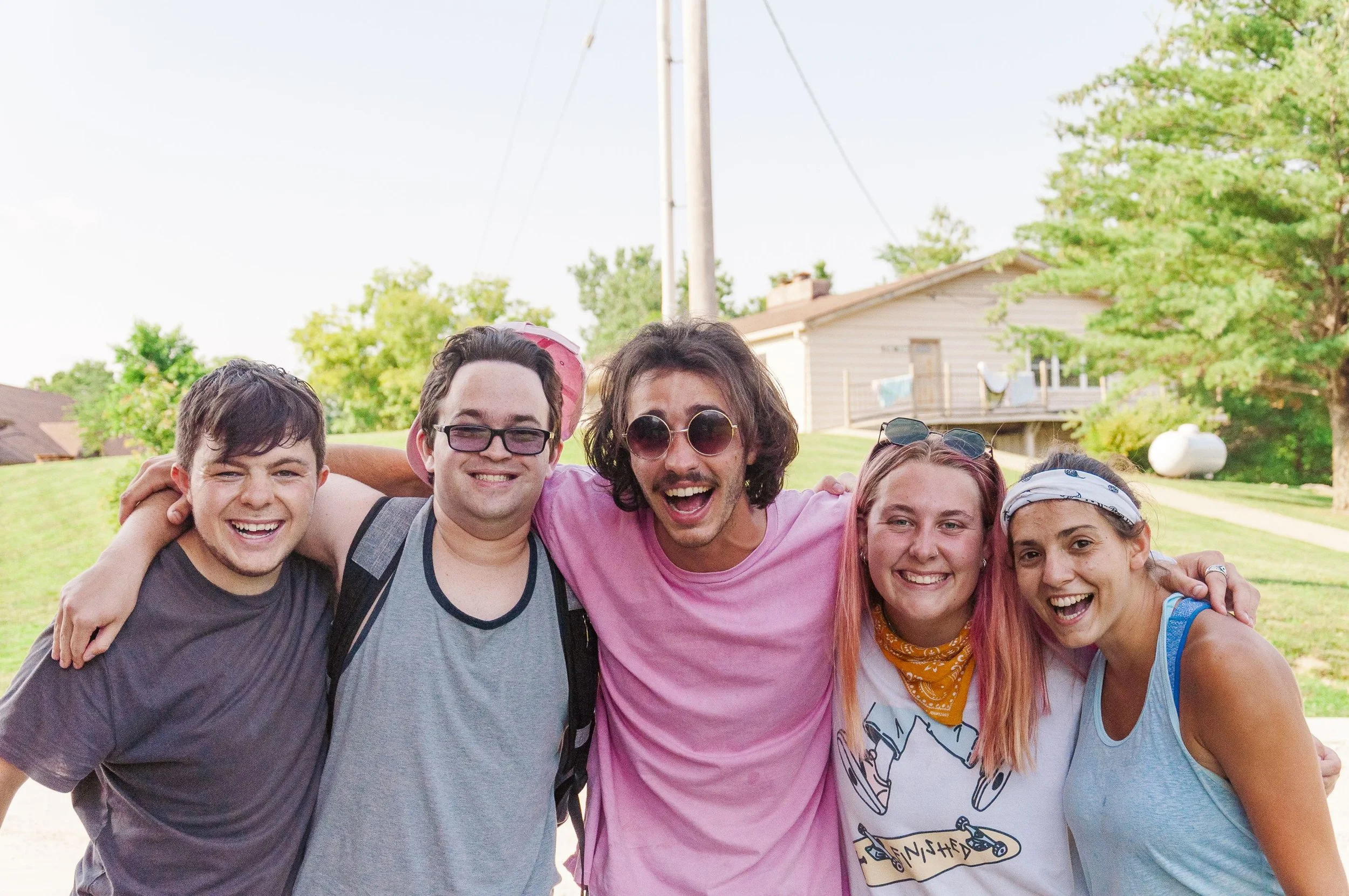 Heartland Christian Camp Paid Gap Year Internship Men and Women standing and smiling Together Outside Near Kansas City, Missouri