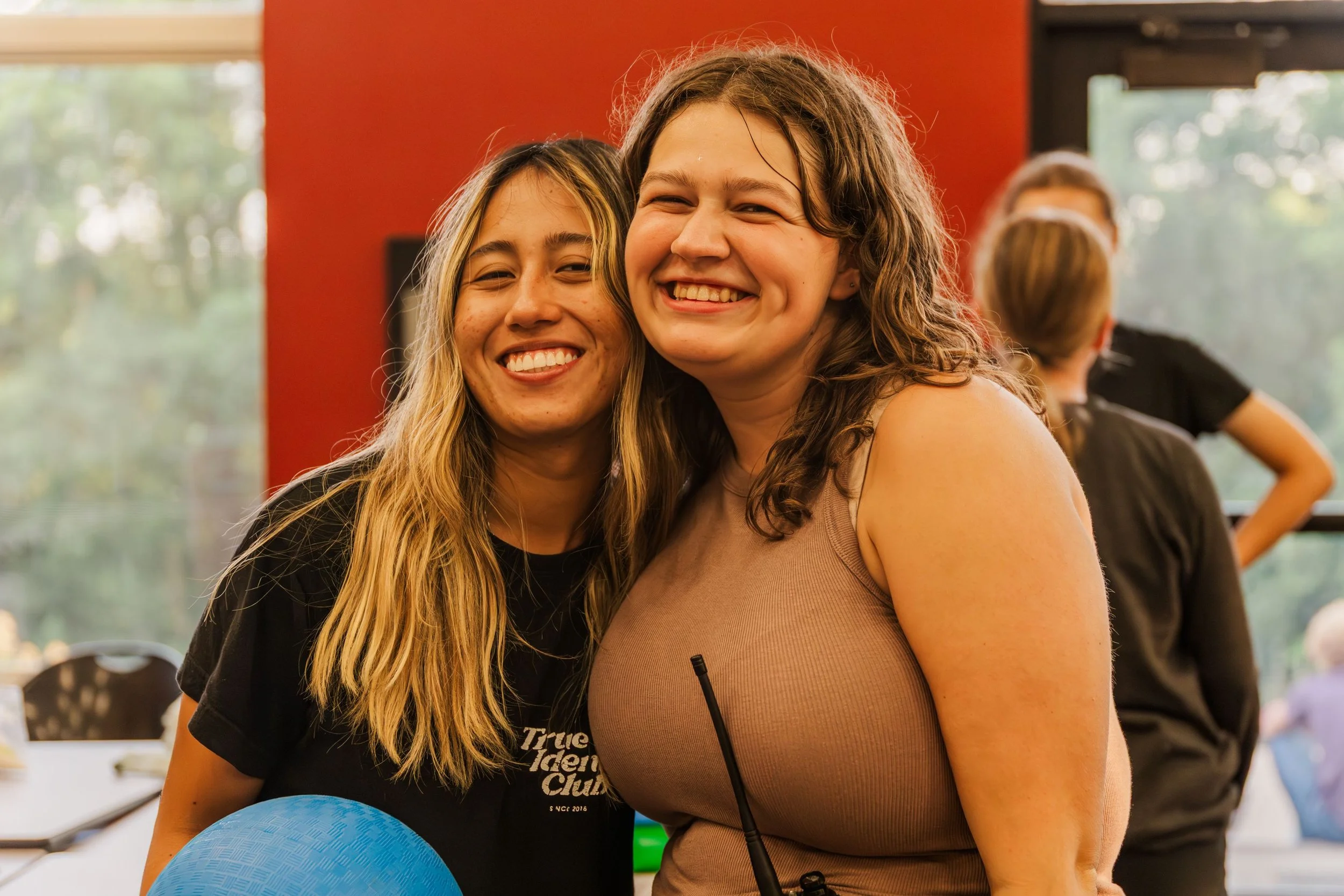 Heartland Christian Camp Paid Gap Year Internship Women Standing and Smiling Together Near Kansas City, Missouri