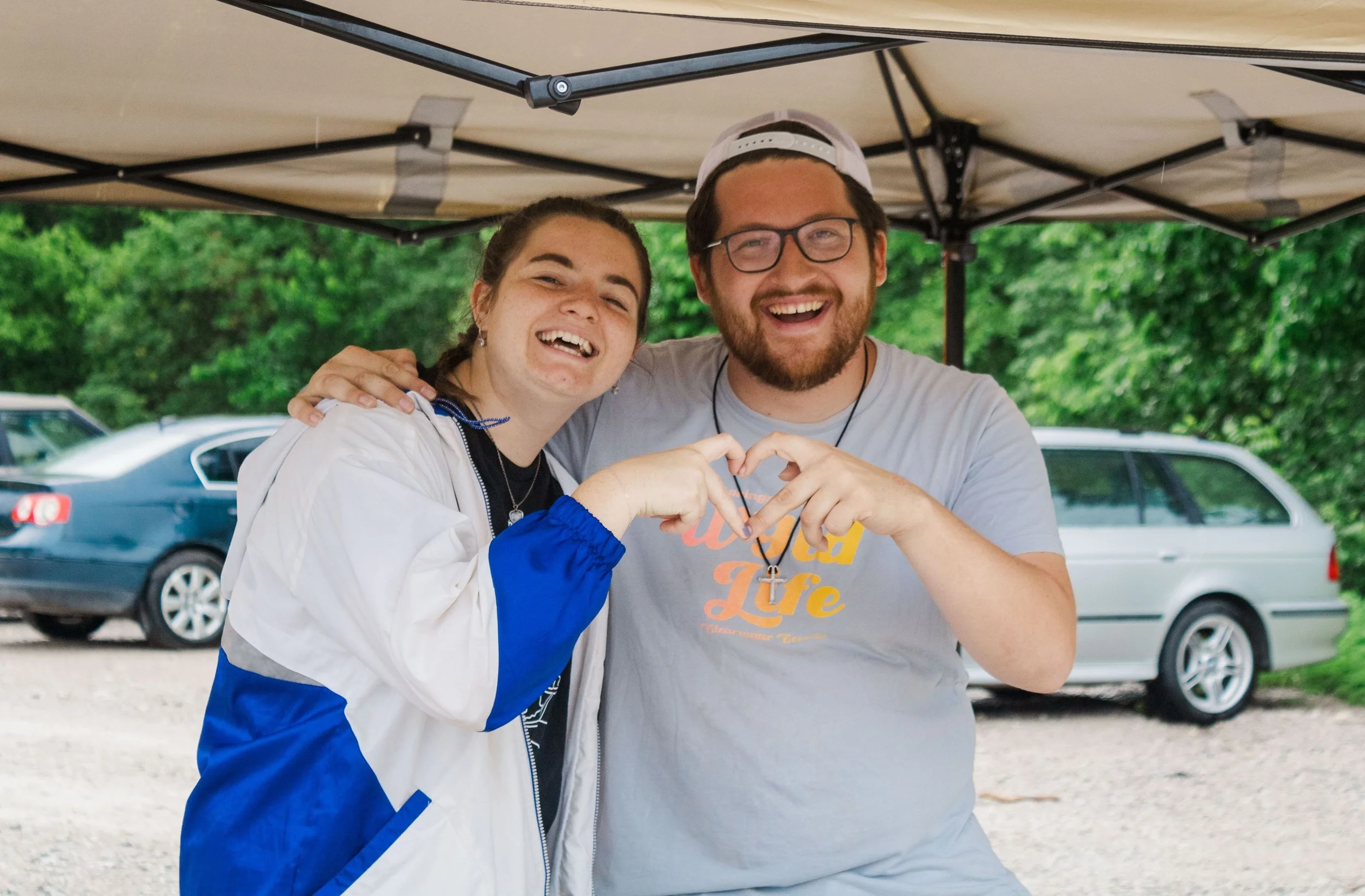 Heartland Christian Camp Paid Gap Year Internship Man and Woman Standing and Smiling Together Outside Near Kansas City, Missouri