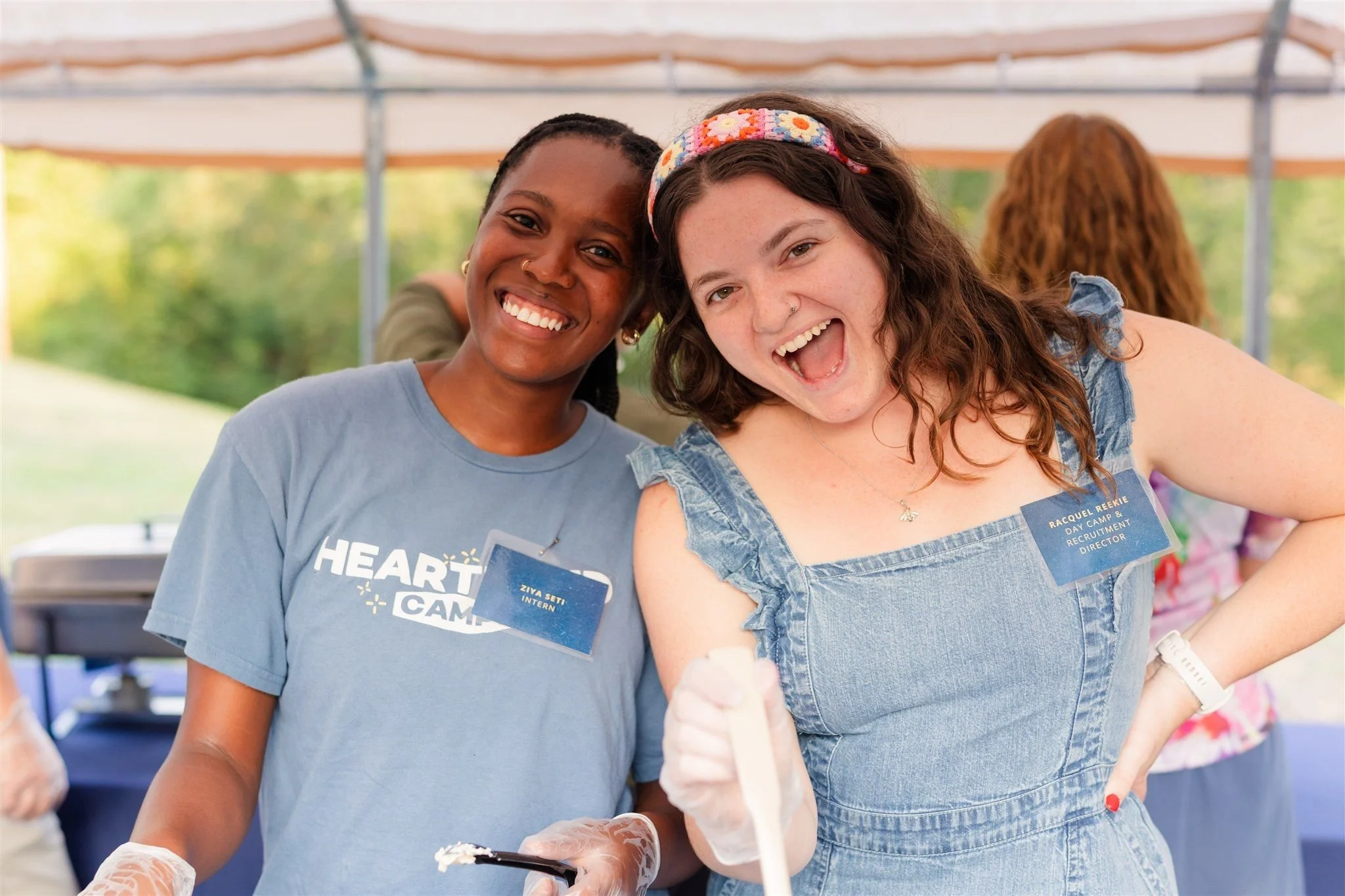 Heartland Christian Camp Paid Gap Year Internship women working and smiling together Outside Near Kansas City, Missouri