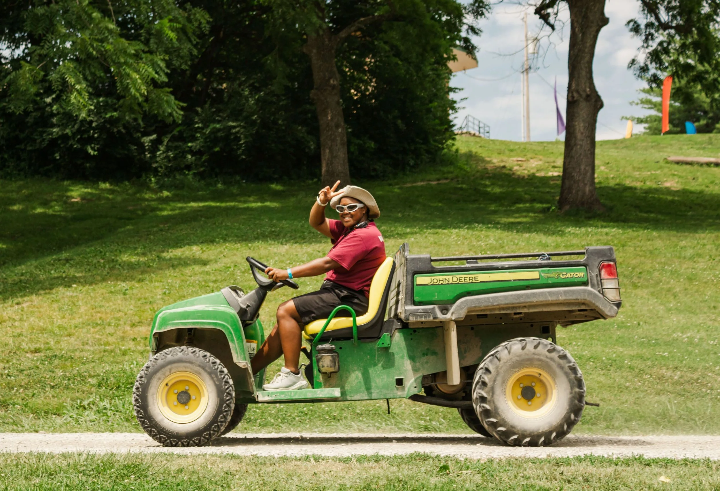 Heartland Christian Camp Paid Gap Year Internship woman driving and smiling together Outside Near Kansas City, Missouri