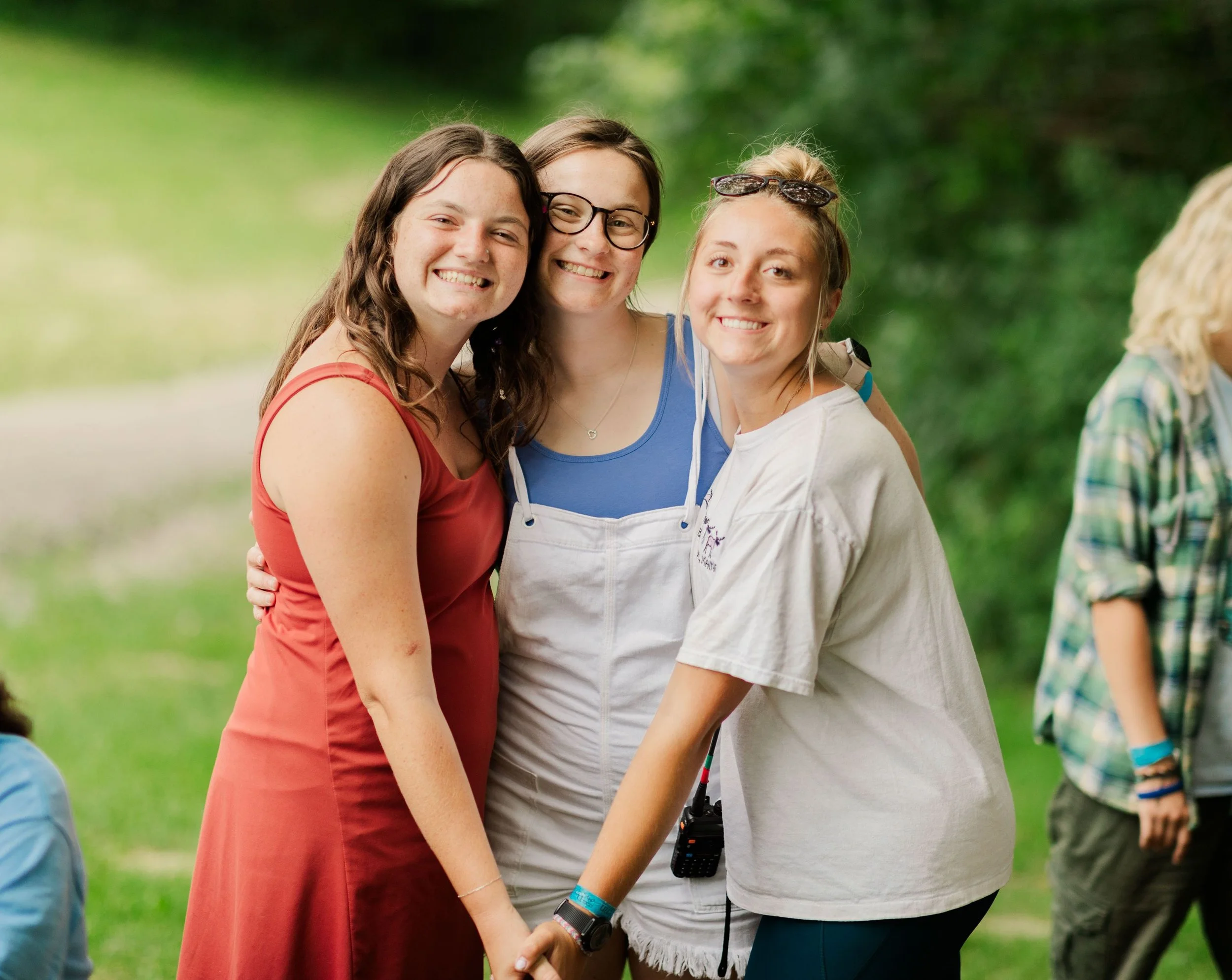 Heartland Christian Camp Paid Gap Year Internship women standing and smiling together Outside Near Kansas City, Missouri