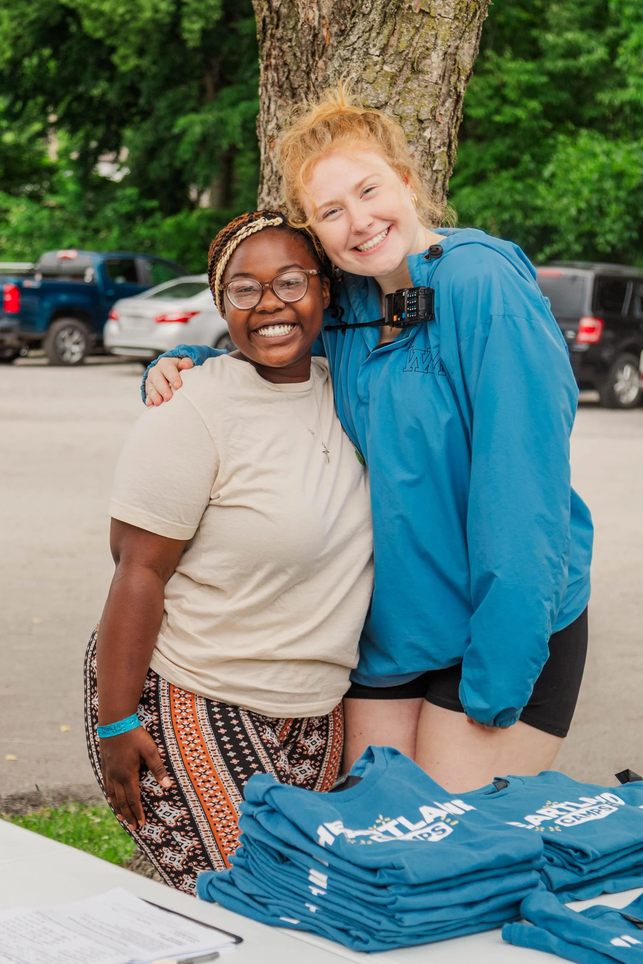 Heartland Christian Camp Paid Gap Year Internship women standing and smiling together Outside Near Kansas City, Missouri
