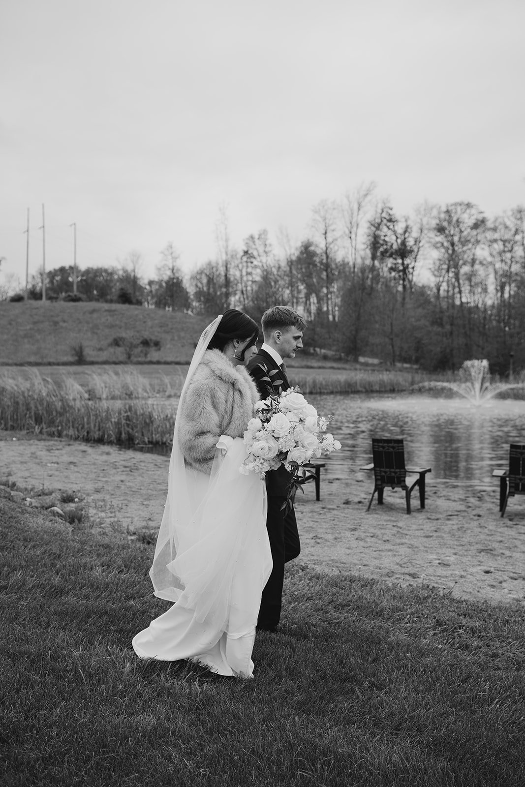 Bride and Groom Walking with Bouquet