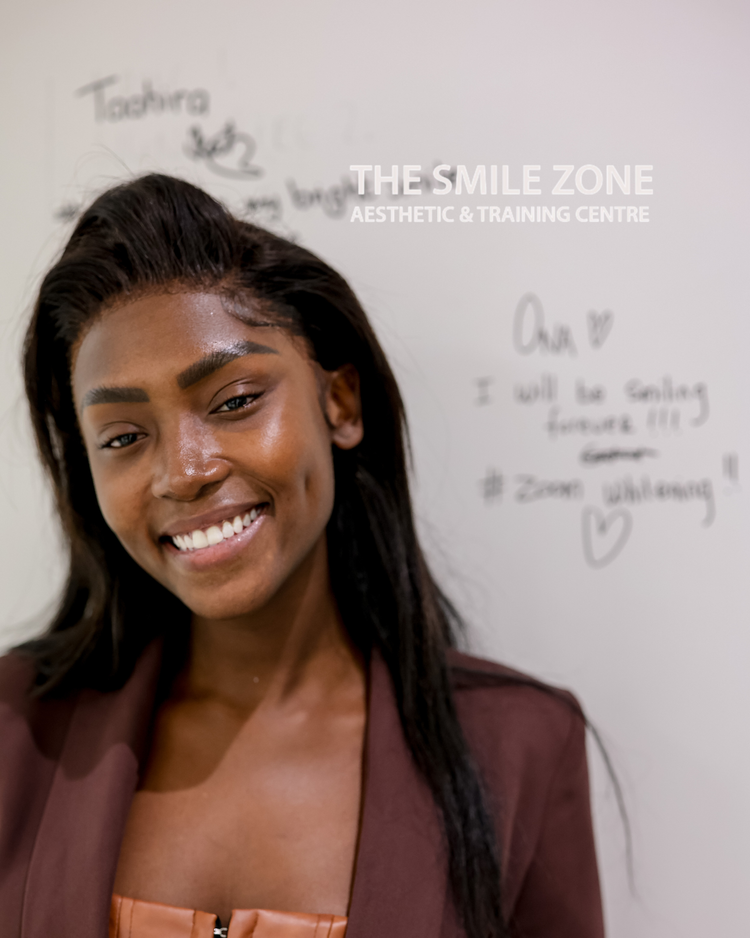 Smiling woman photographed at The Smile Zone