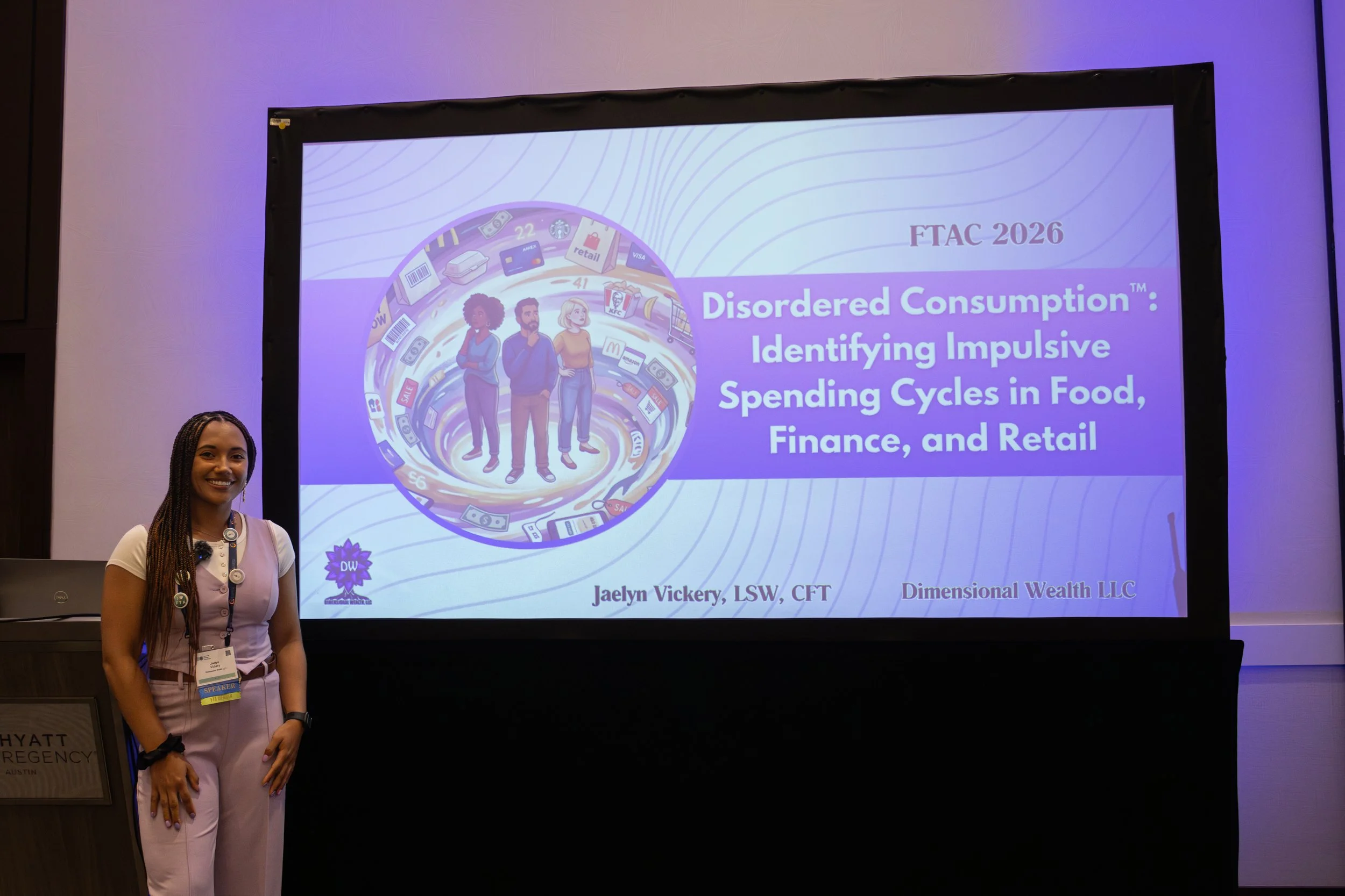 Financial therapist Jaelyn Vickery presenting on disordered consumption™ and impulsive spending cycles at the Financial Therapy Association Conference.
