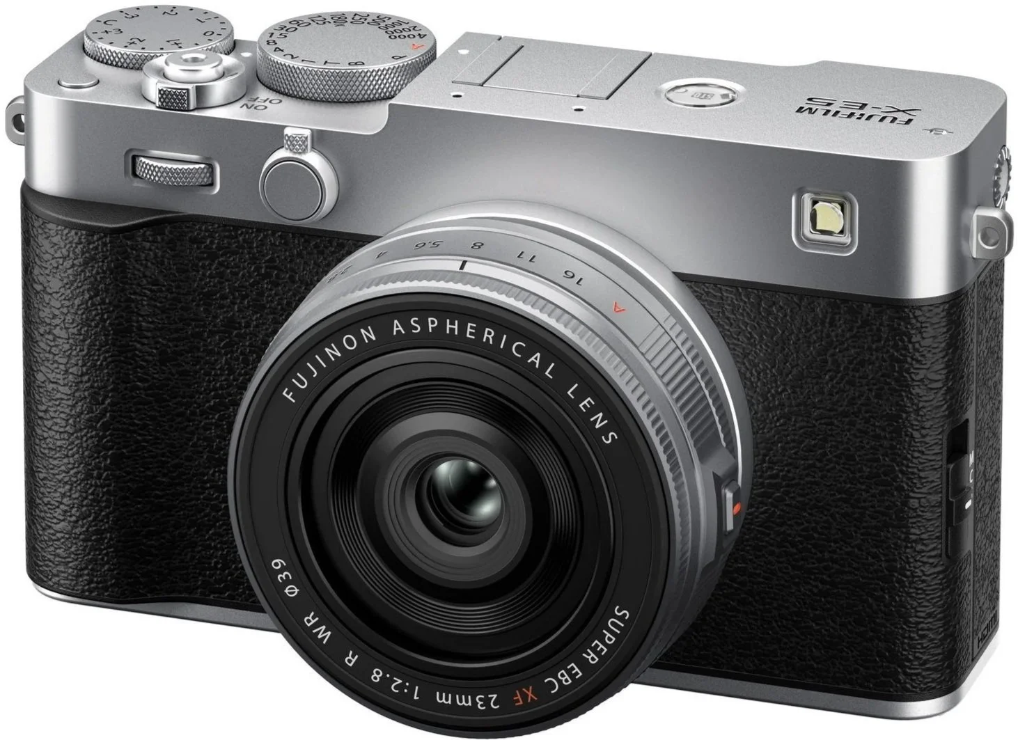 Silver mirrorless camera with a black textured grip, black lens, and various control dials on top.