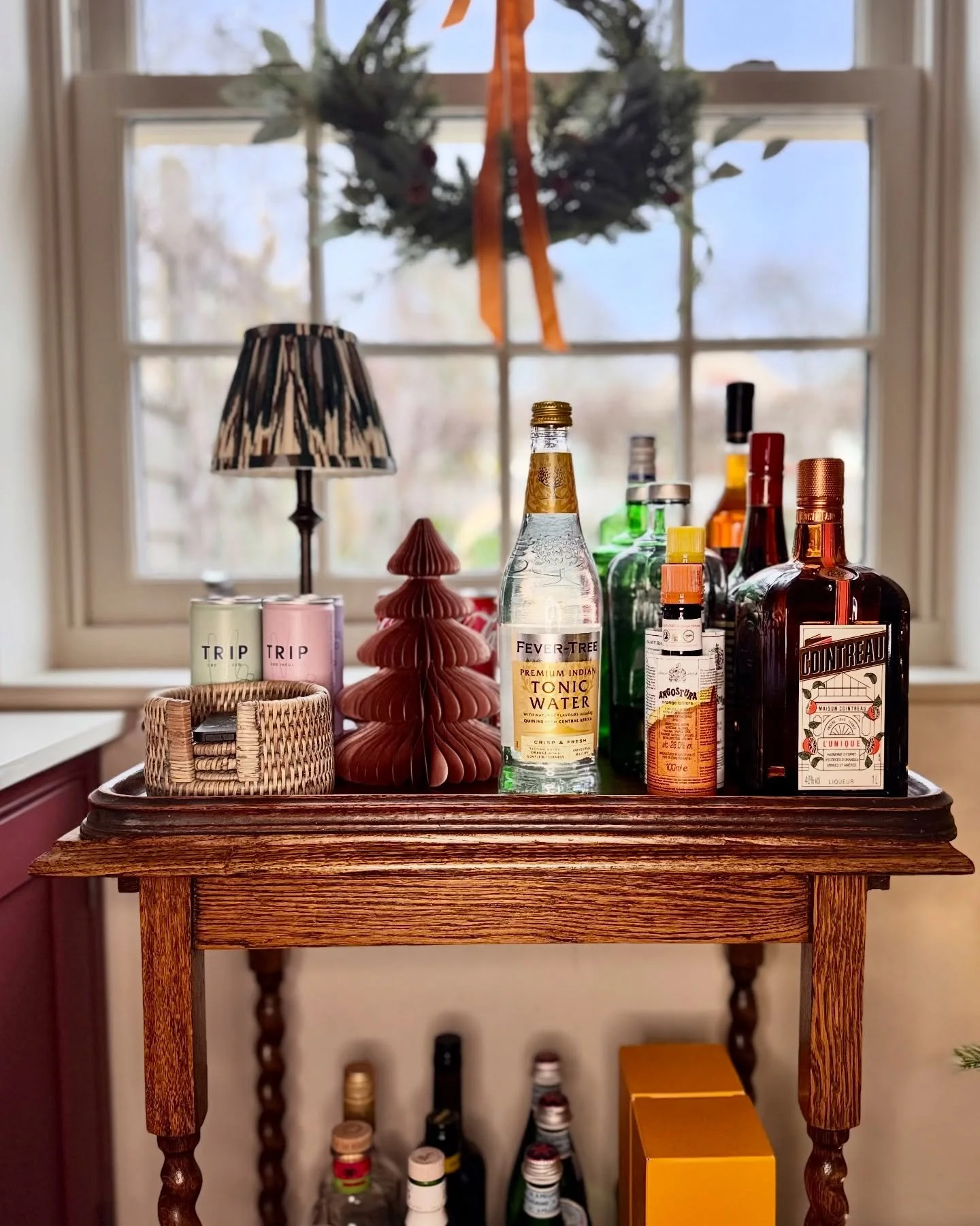 These darker evenings call for slower rituals.
Lighting a seasonal candle, pouring something simple, and letting the house gently wind itself down.

The drinks trolley is one of those small but lovely additions that really earns its keep at this time