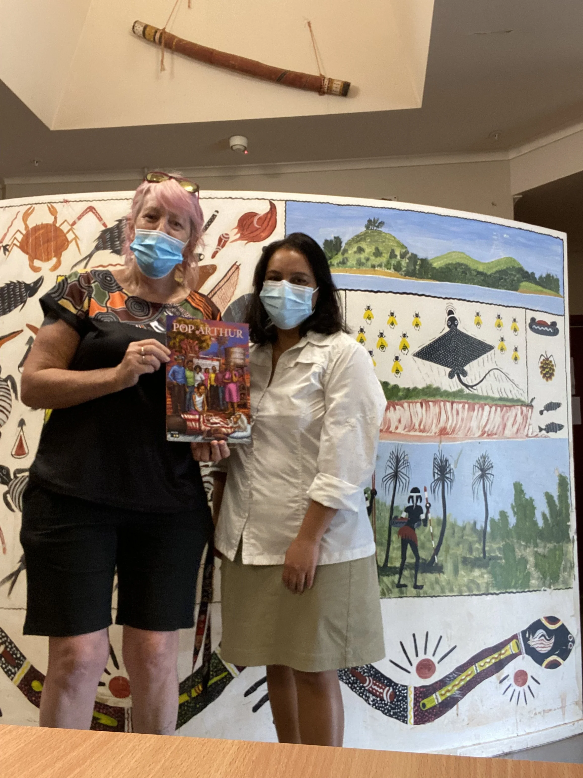 communitymembersholdingbook
