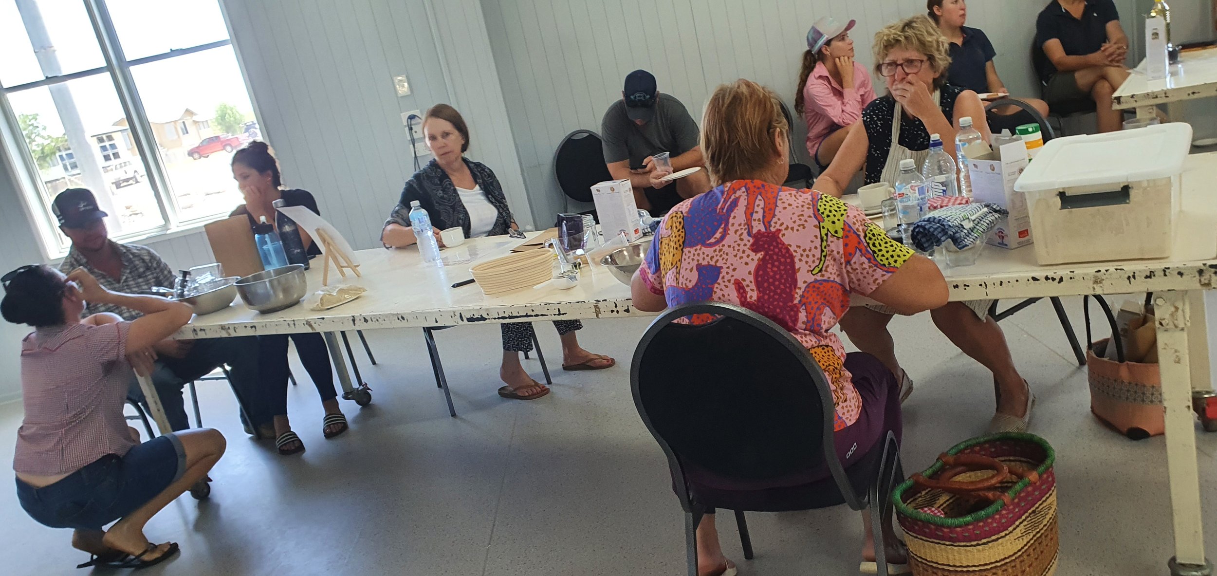 communitymemberswaitingfordoughtorise