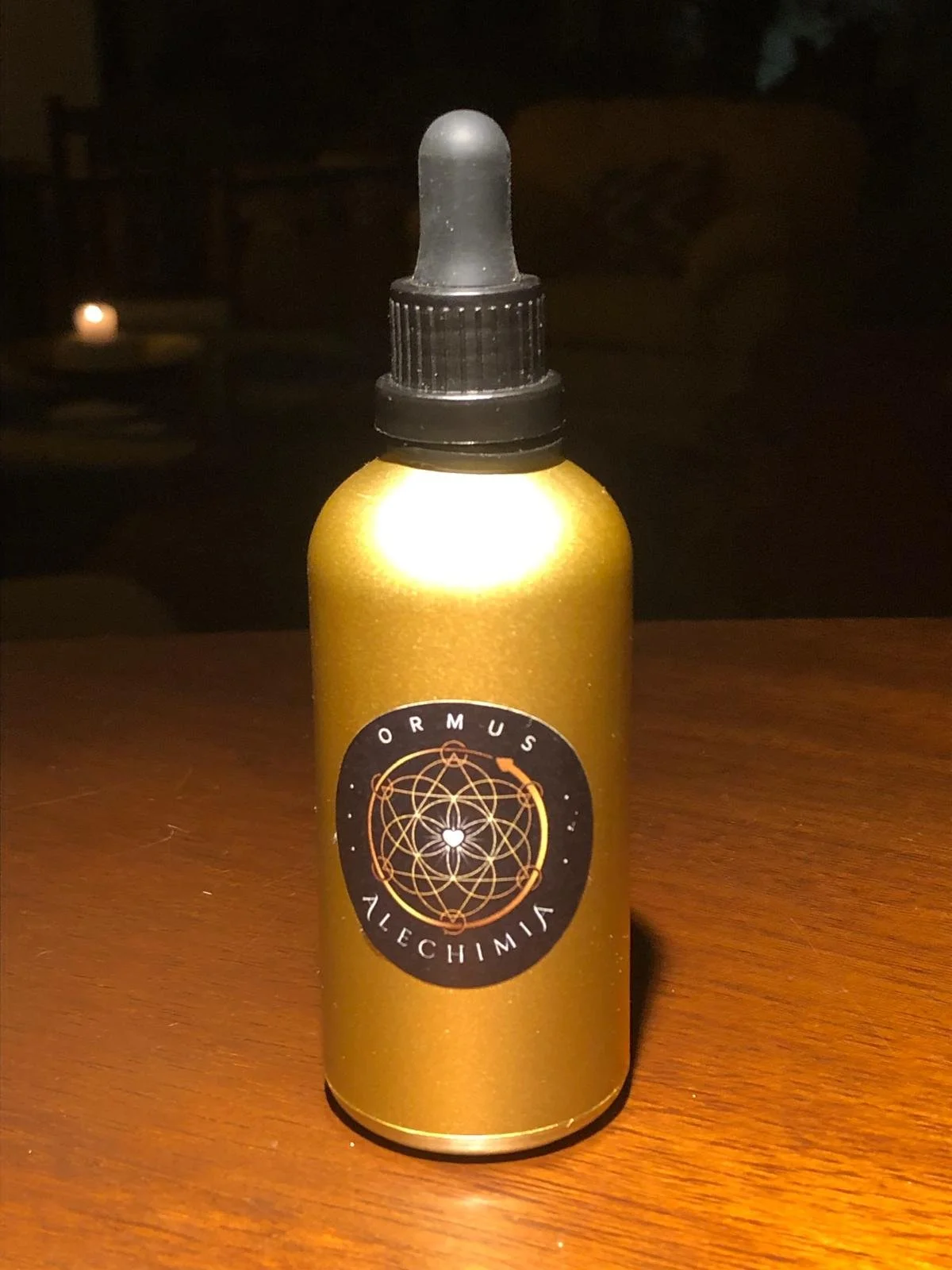 Ormus bottle spotlight from above.jpeg