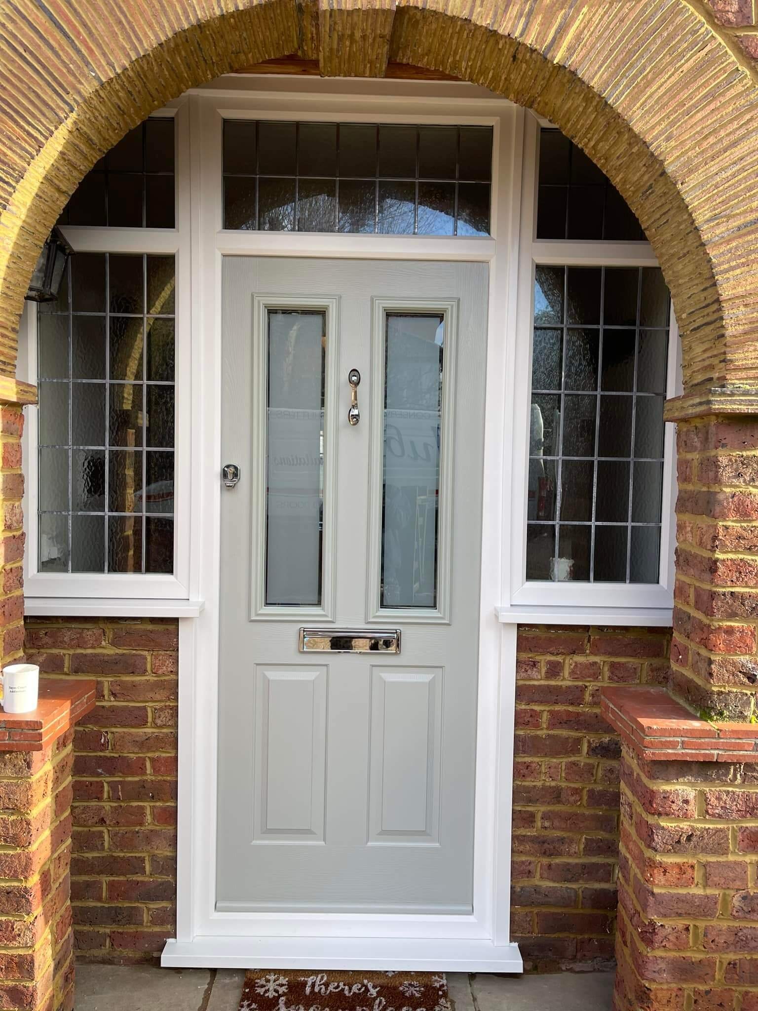 The upper glazed sections are fitted with satin sandblasted glass, offering privacy while still allowing natural light to filter through. A subtle, clear keyline around each panel adds a delicate detail that enhances the overall design. The door is f