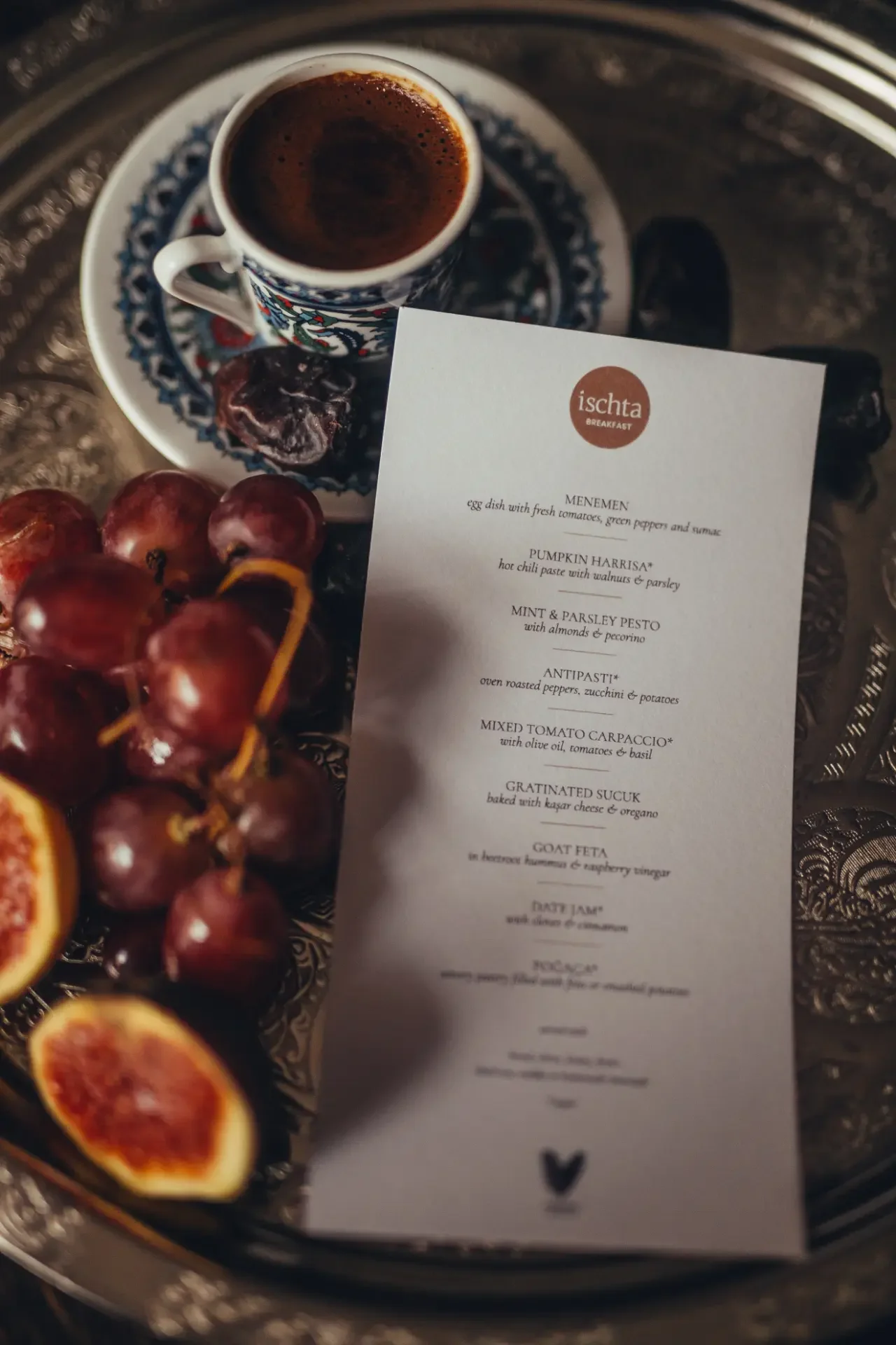 Mediterranean breakfast menu styled with fresh fruit and traditional Turkish table setting