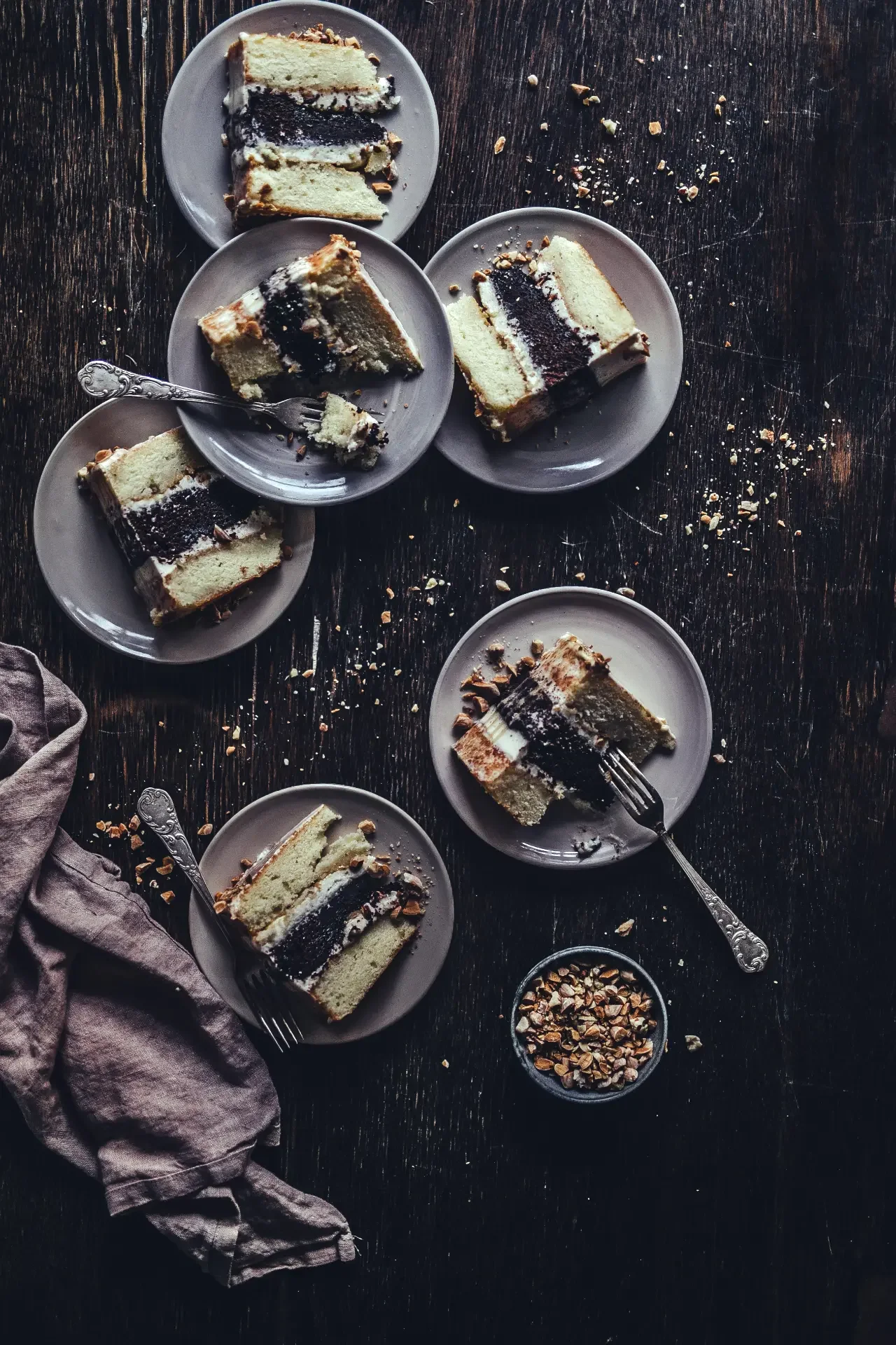 Tahini cake styled with seasonal flowers and linen
