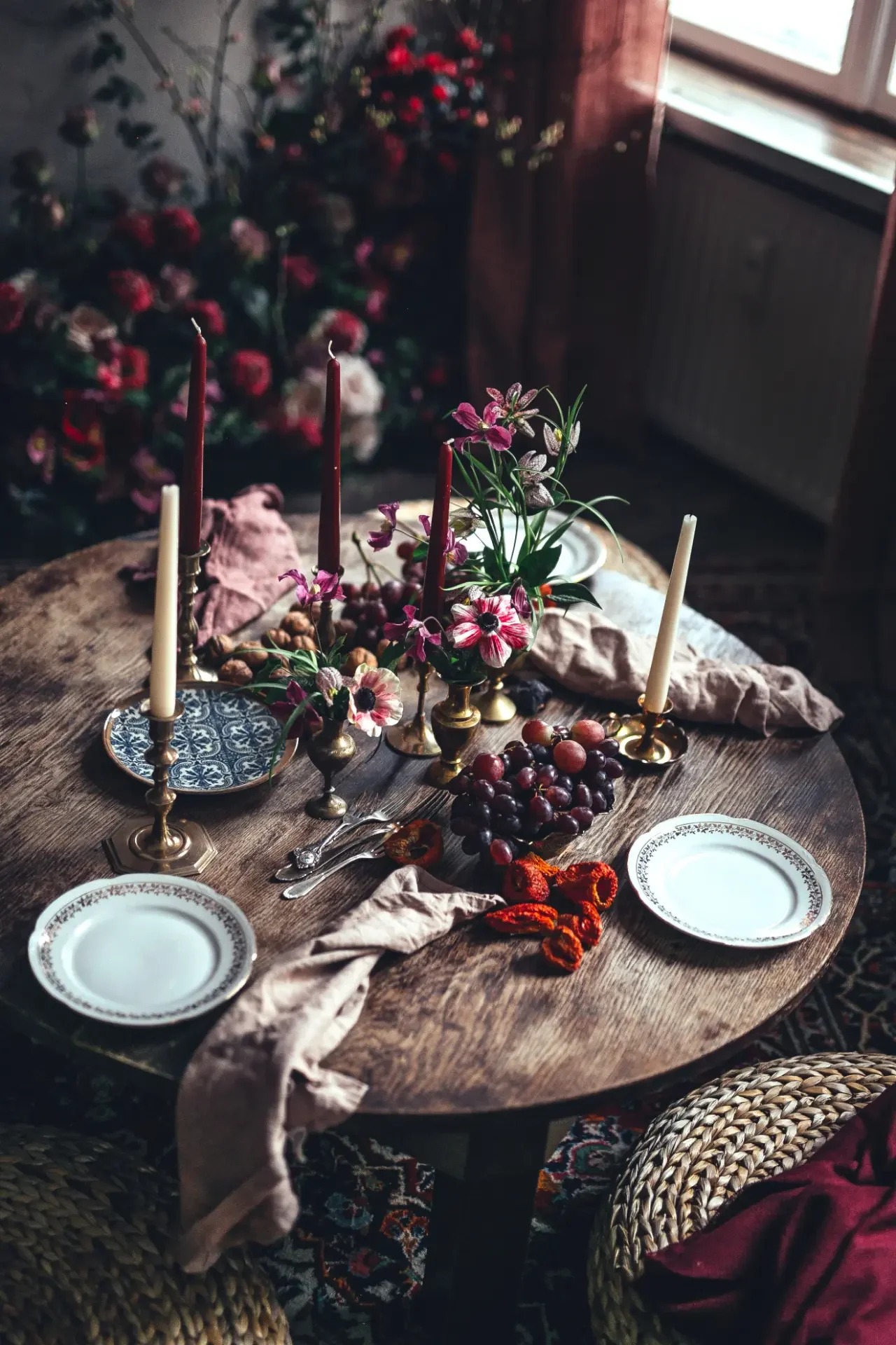 Mediterranean sofra table with flowers, candles and handcrafted mezze dishes