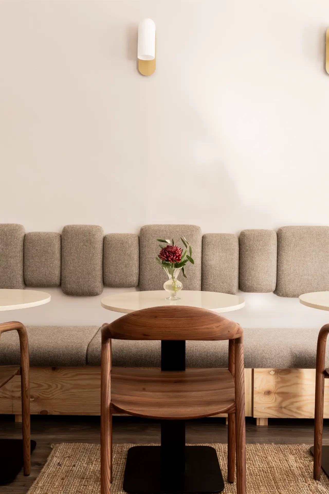Minimalist seating area with custom furniture inside Dilekerei cake studio Berlin