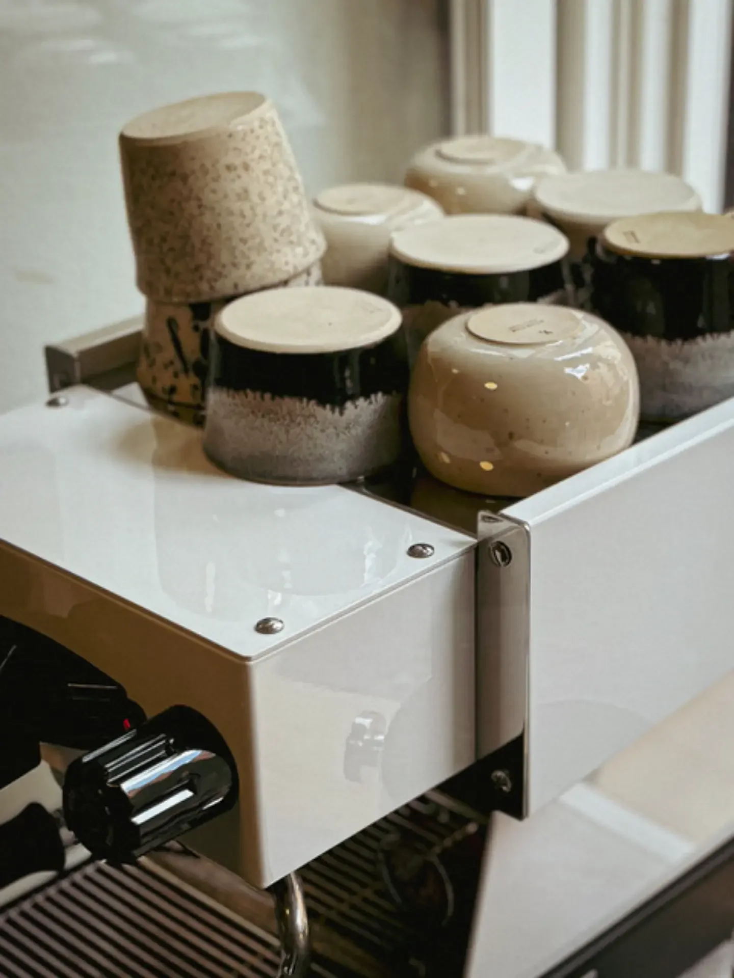 Coffee station setup with handcrafted ceramics and specialty beverages