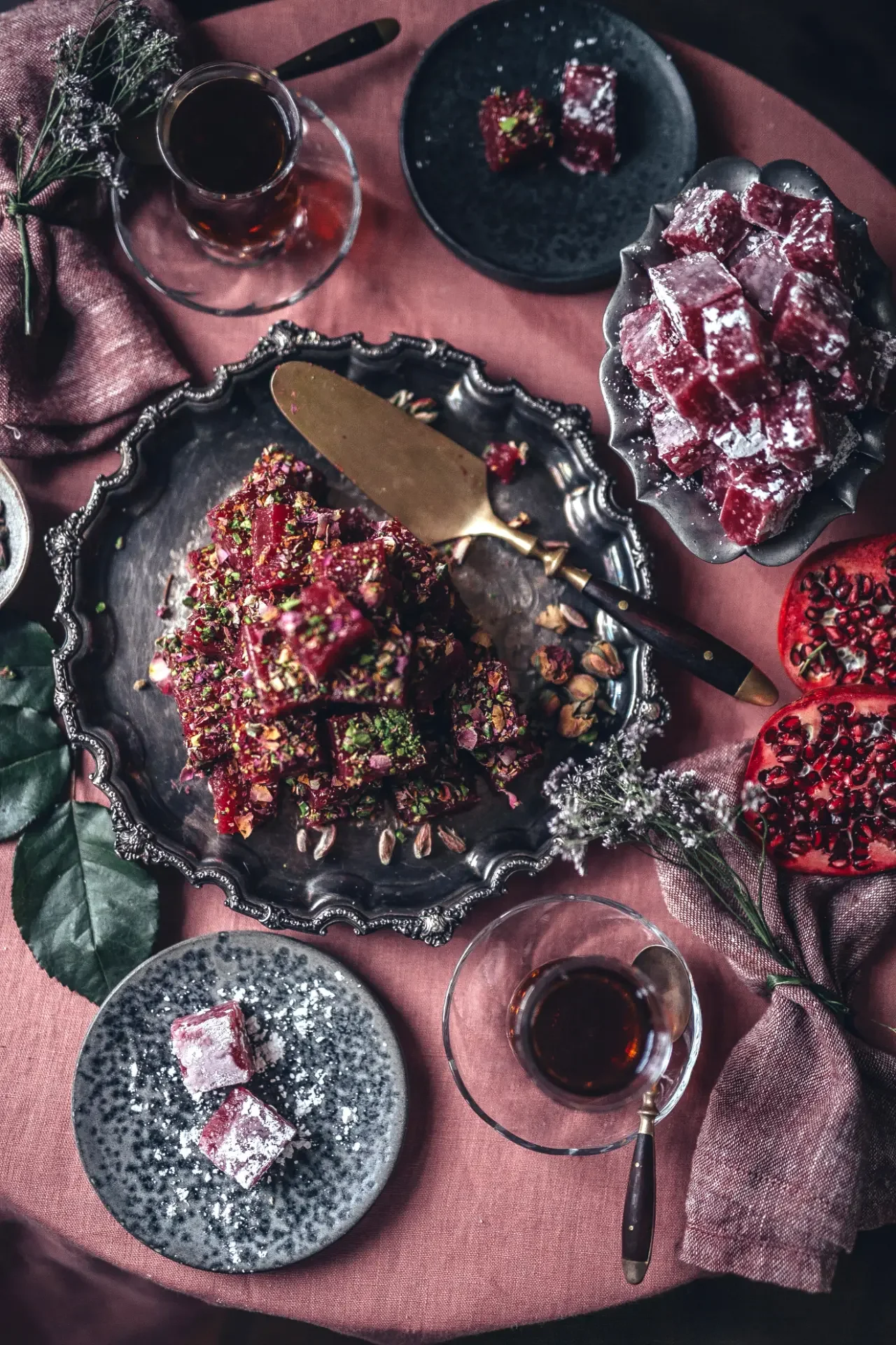 Close-up of Turkish lokum topped with chopped pistachios and dried roses